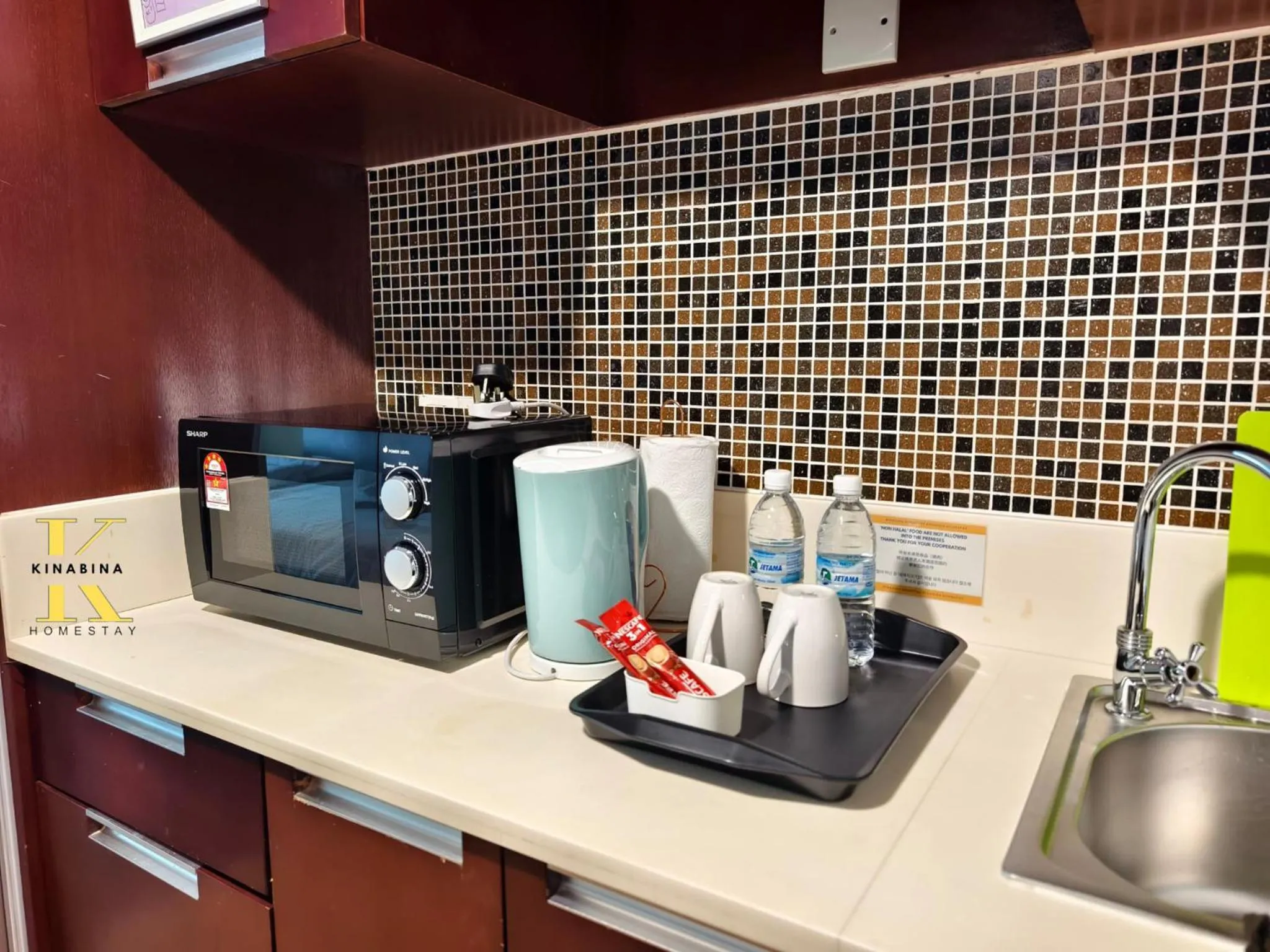 microwave in South China Sea Place by Kinabina Homestay