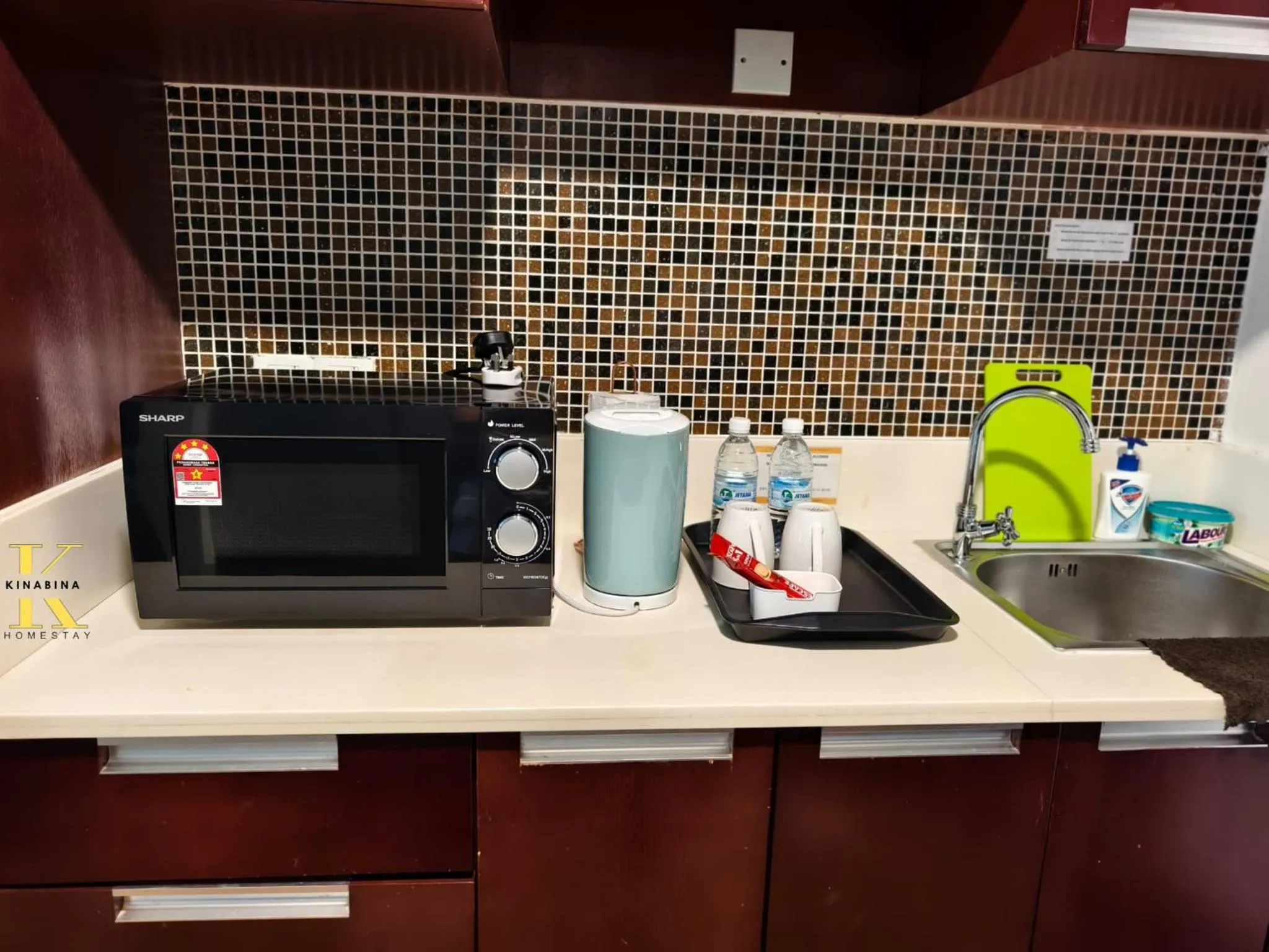 microwave in South China Sea Place by Kinabina Homestay