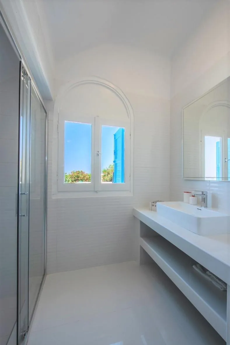 Bed in Adikri Villas & Suites
