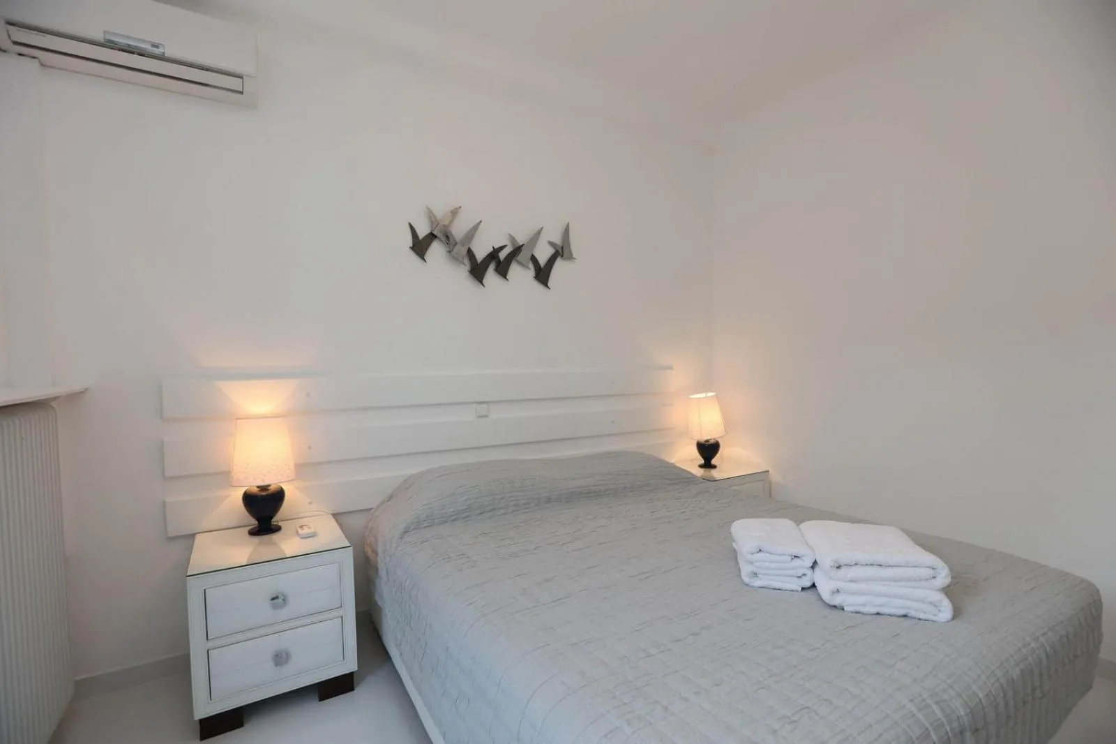 Bed in Adikri Villas & Suites
