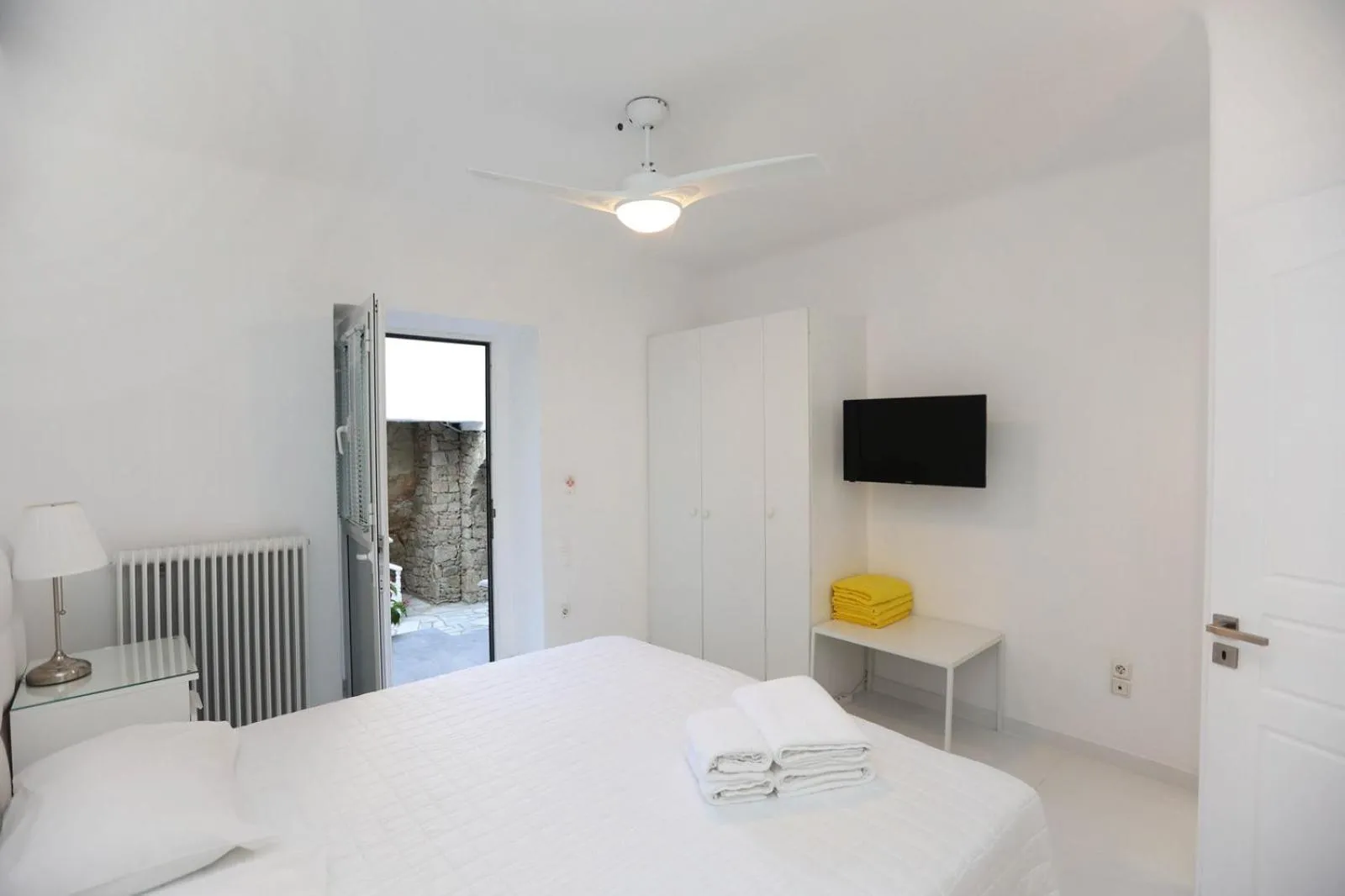 Bed in Adikri Villas & Suites