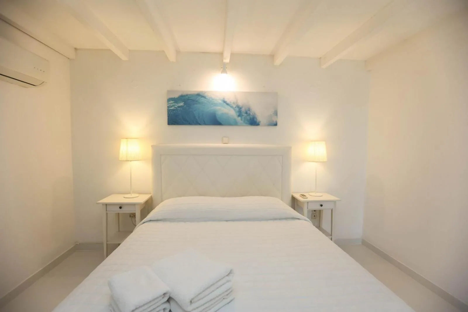 Bed in Adikri Villas & Suites