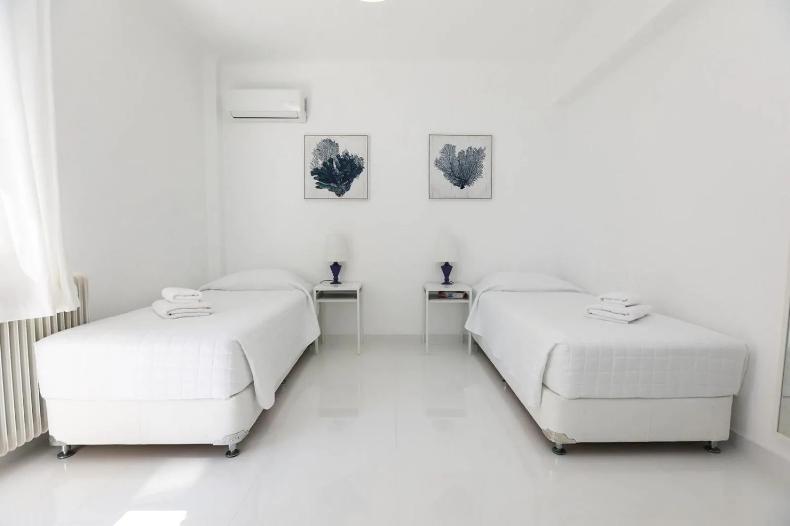 Bed in Adikri Villas & Suites