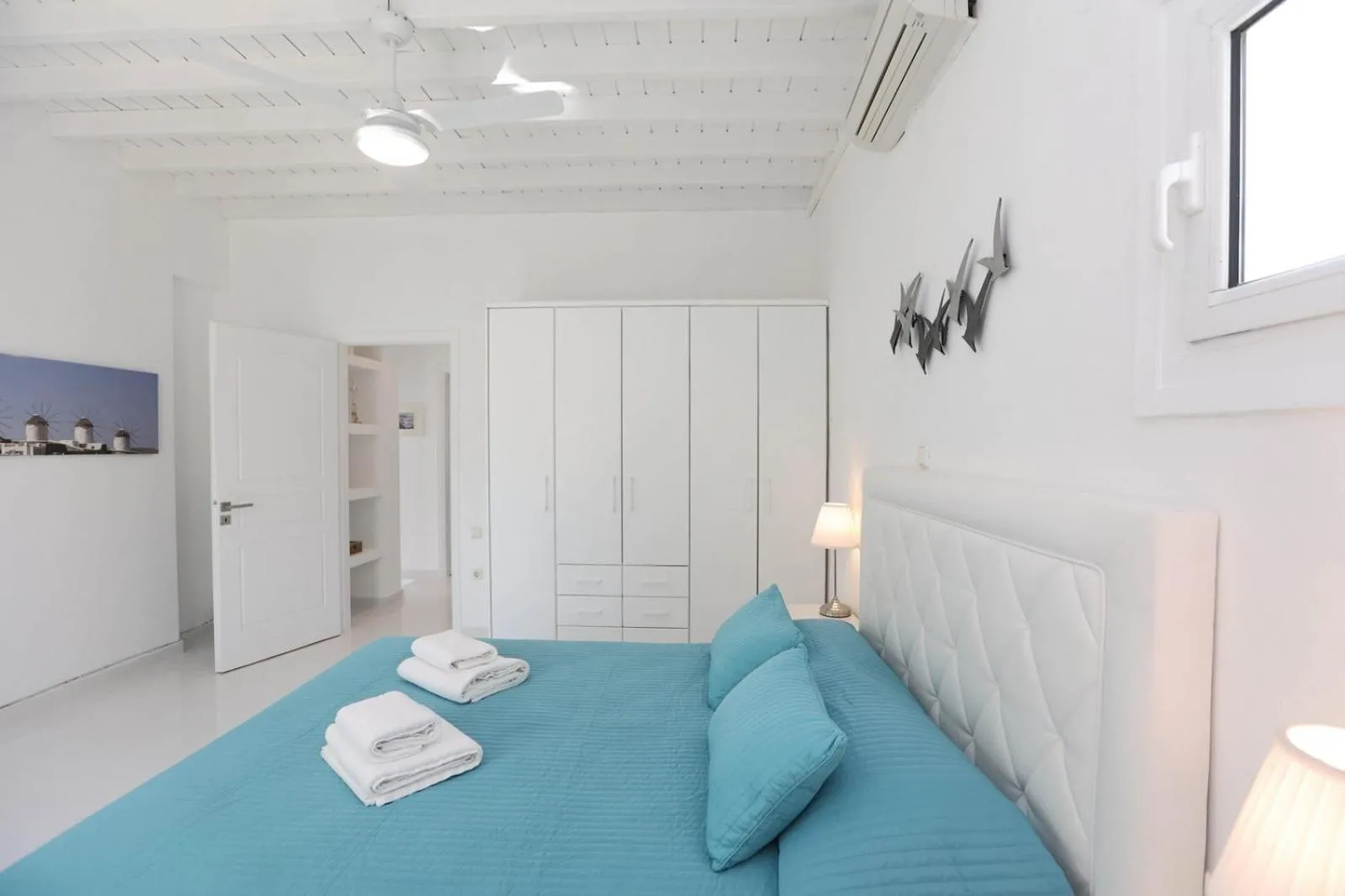 Bed in Adikri Villas & Suites