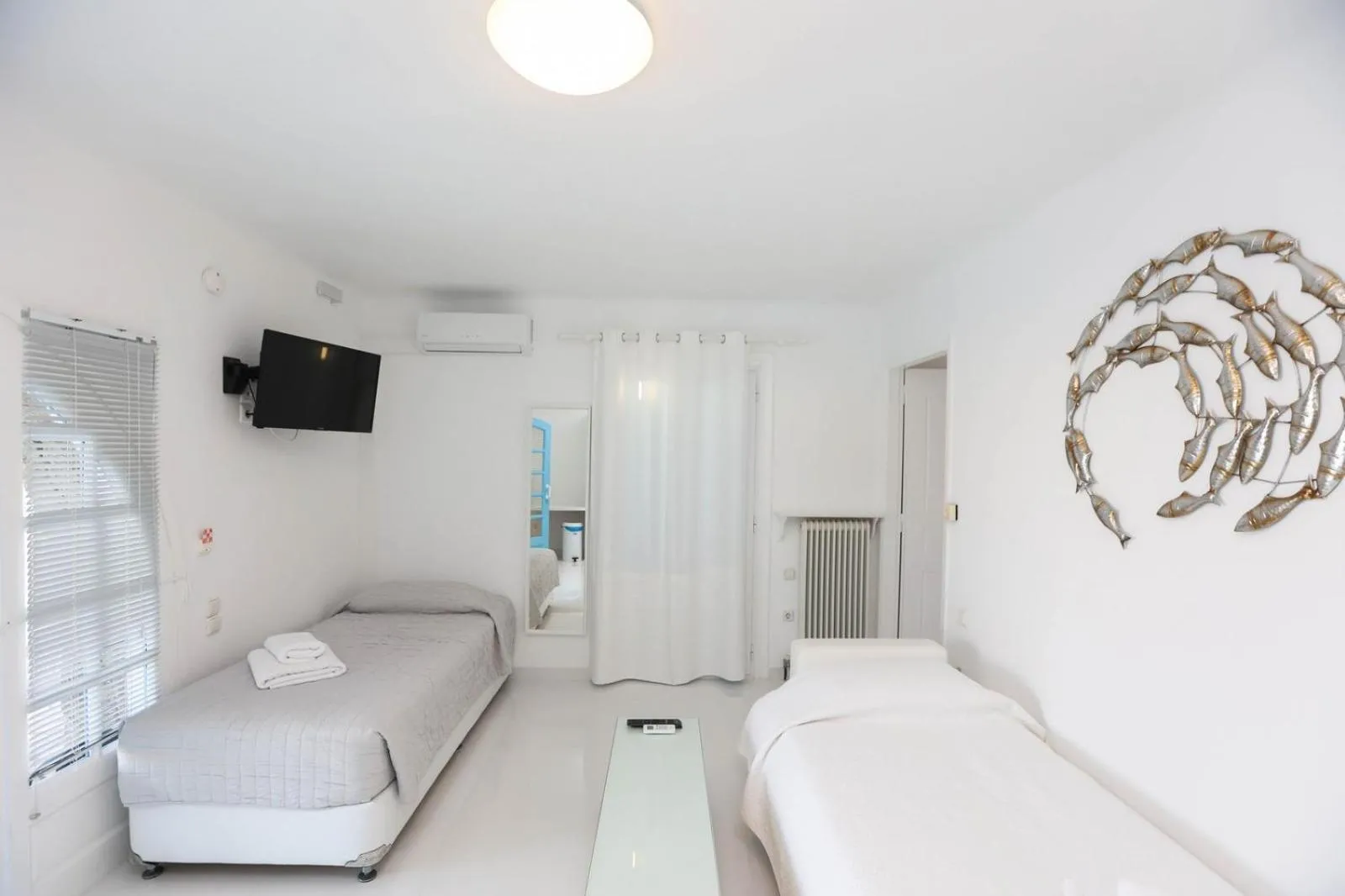Bed in Adikri Villas & Suites