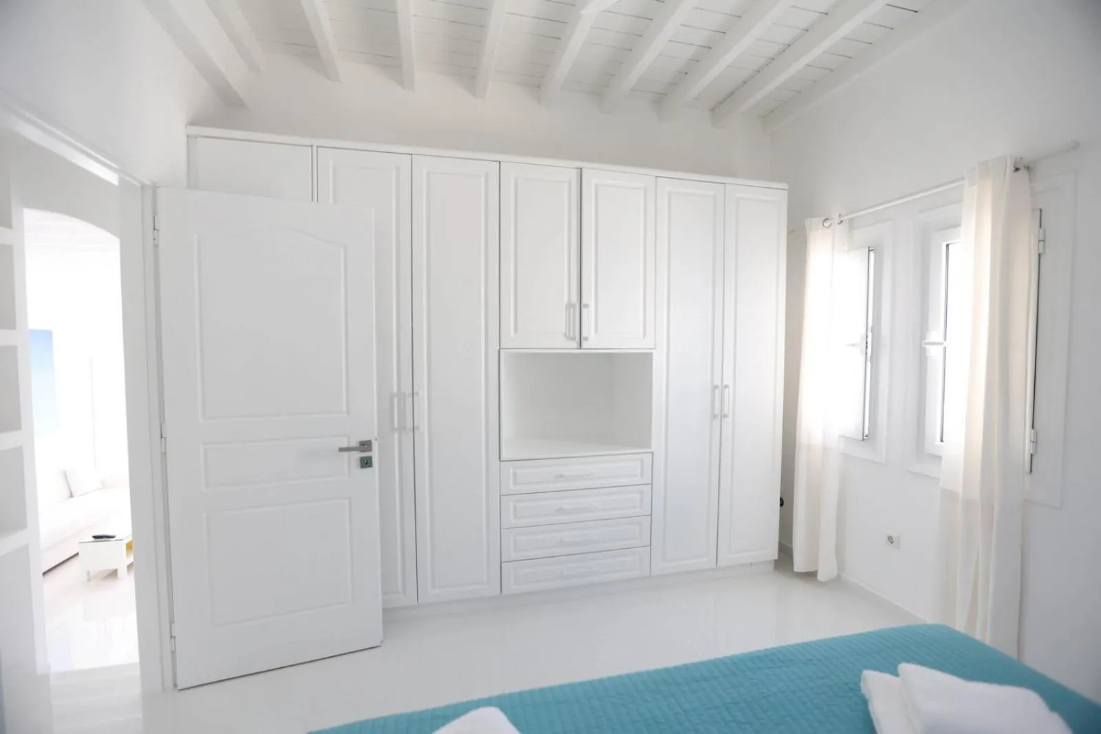 Bed in Adikri Villas & Suites
