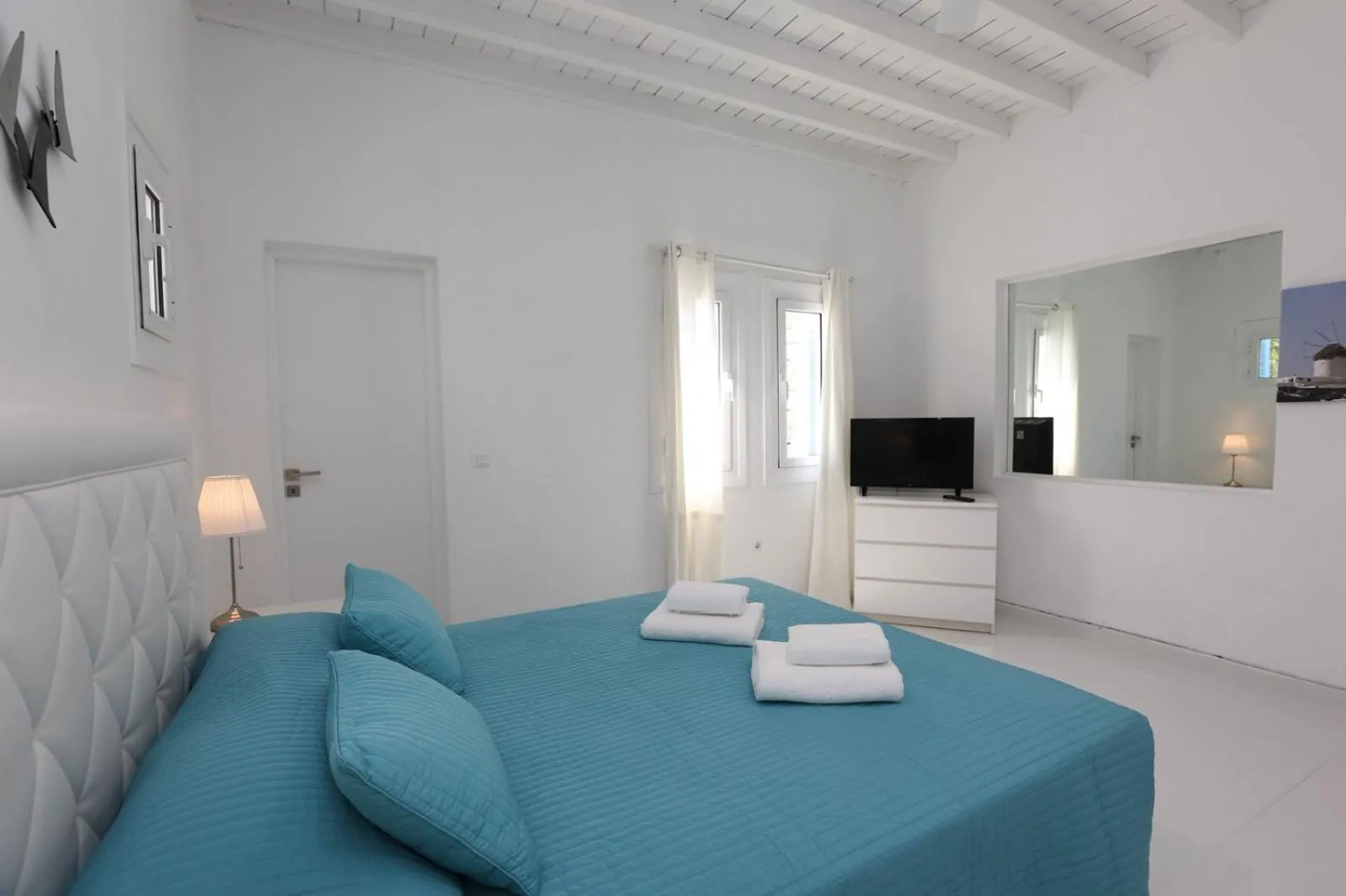 Bed in Adikri Villas & Suites