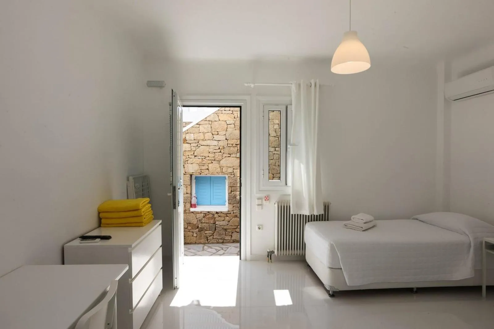 Bed in Adikri Villas & Suites