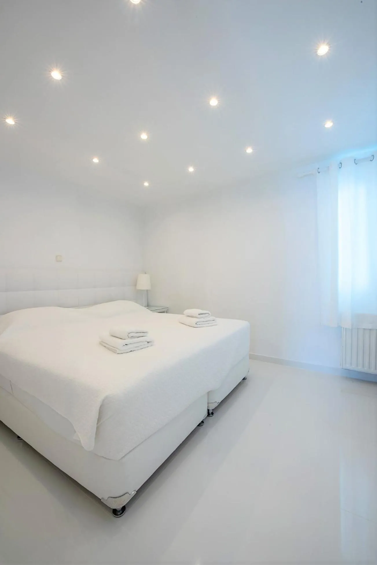 Bed in Adikri Villas & Suites