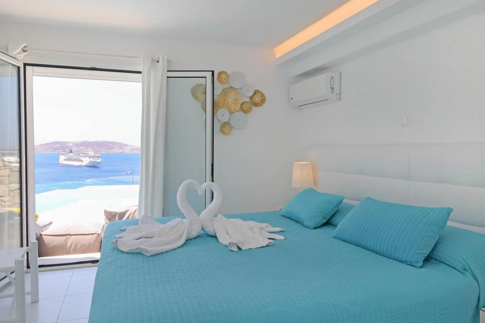 Bed in Adikri Villas & Suites