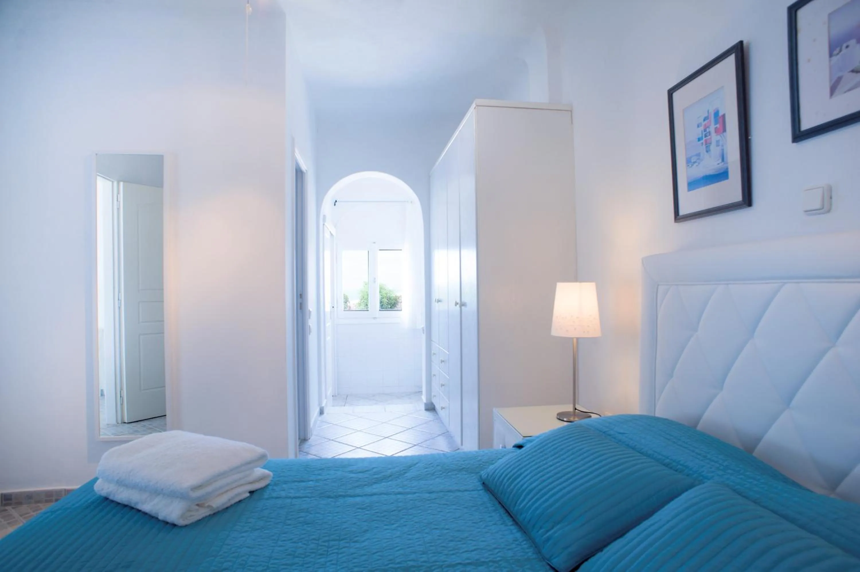 Bed in Adikri Villas & Suites
