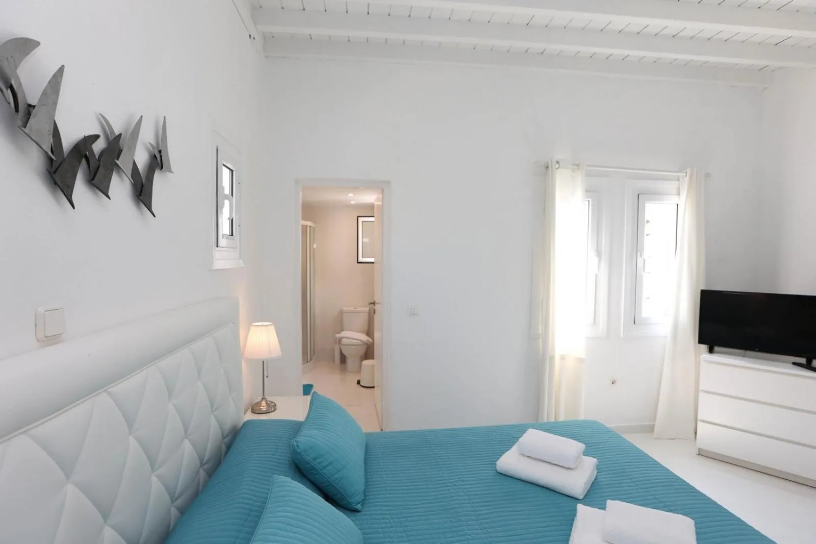 Bed in Adikri Villas & Suites