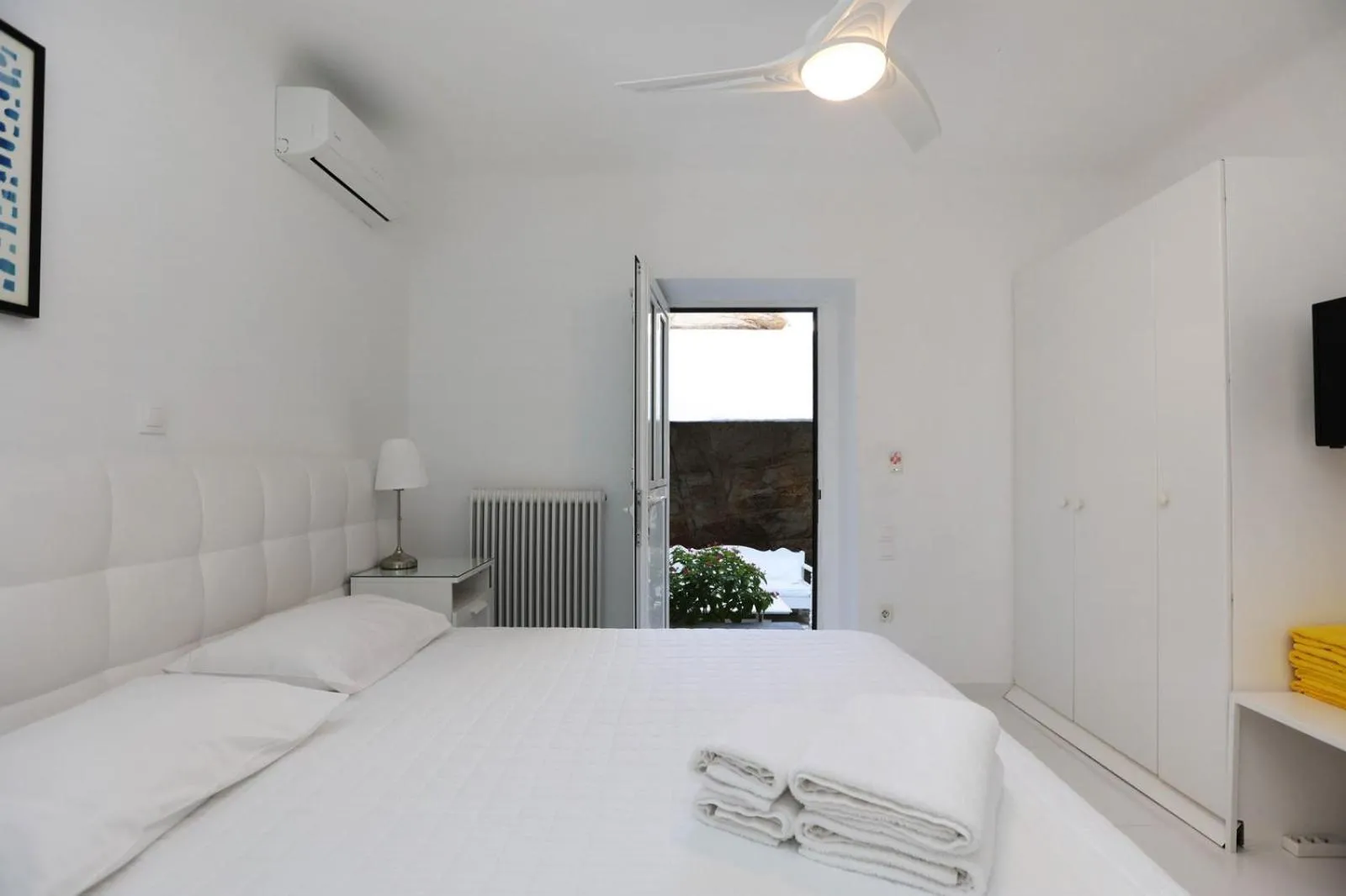 Bed in Adikri Villas & Suites
