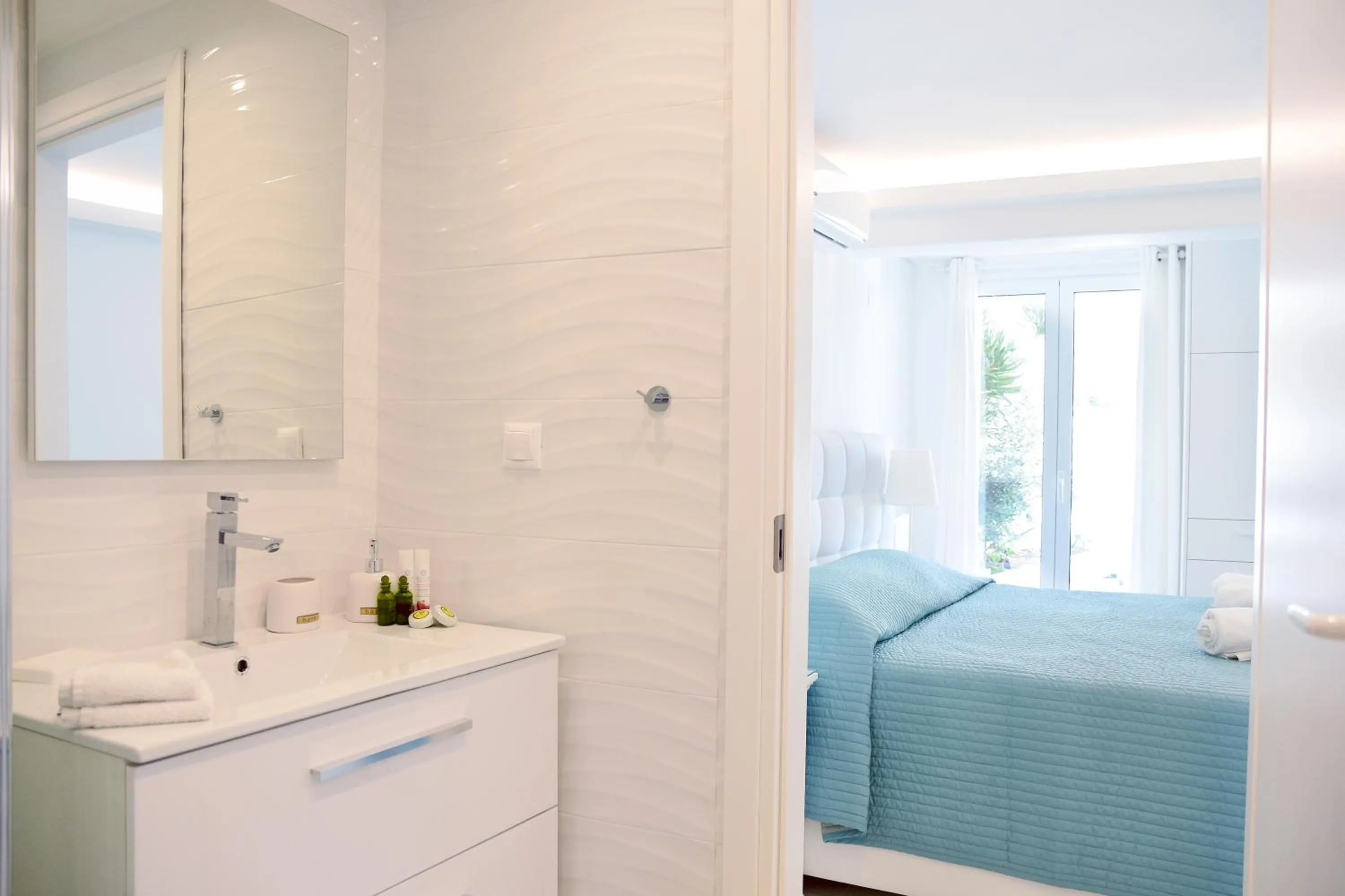 Bed in Adikri Villas & Suites