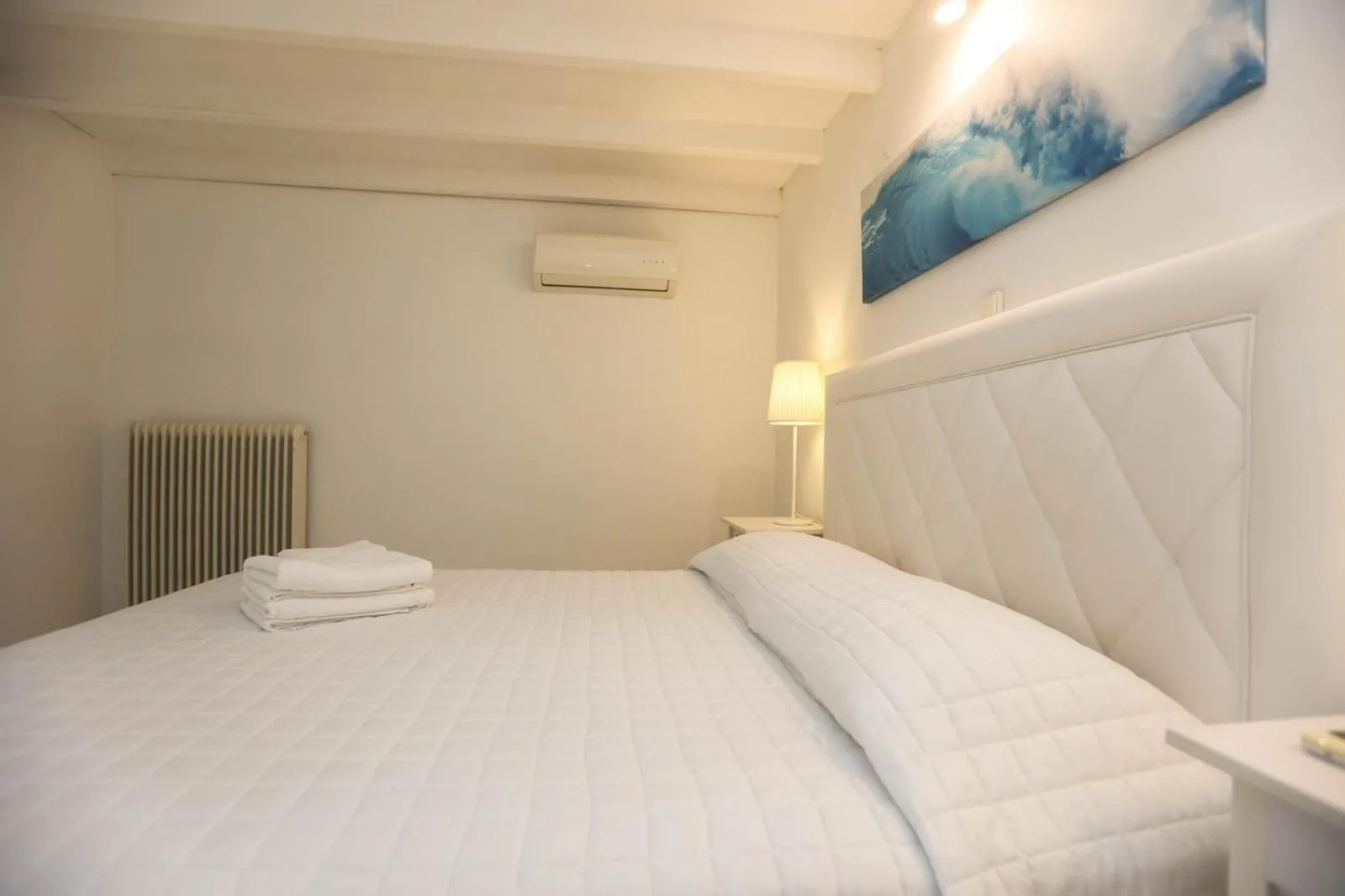 Bed in Adikri Villas & Suites
