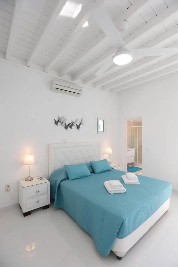 Bed in Adikri Villas & Suites