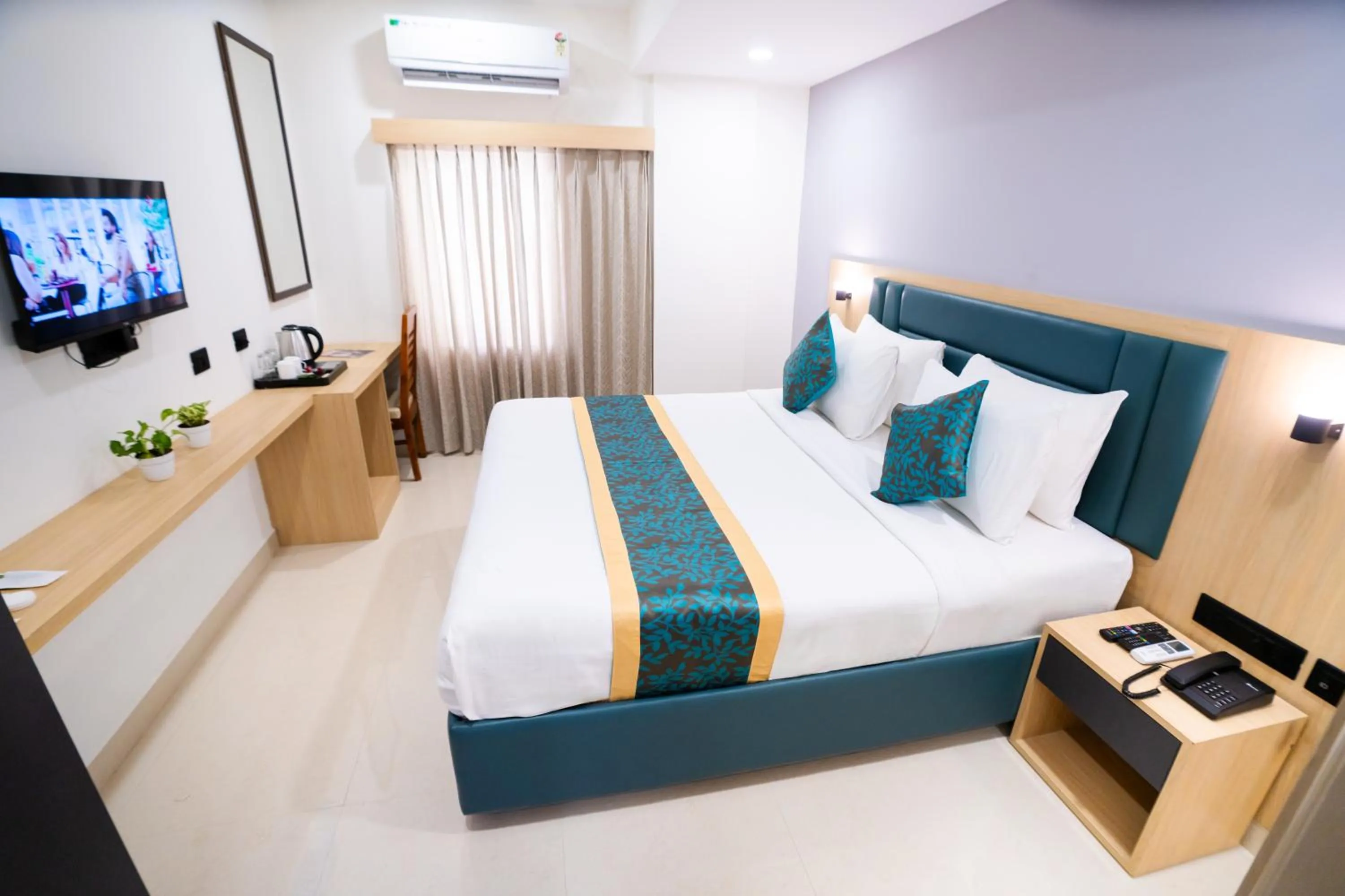 Photo of the whole room, Bed in Sunrise Business Hotel, S R Nagar - Ameerpet