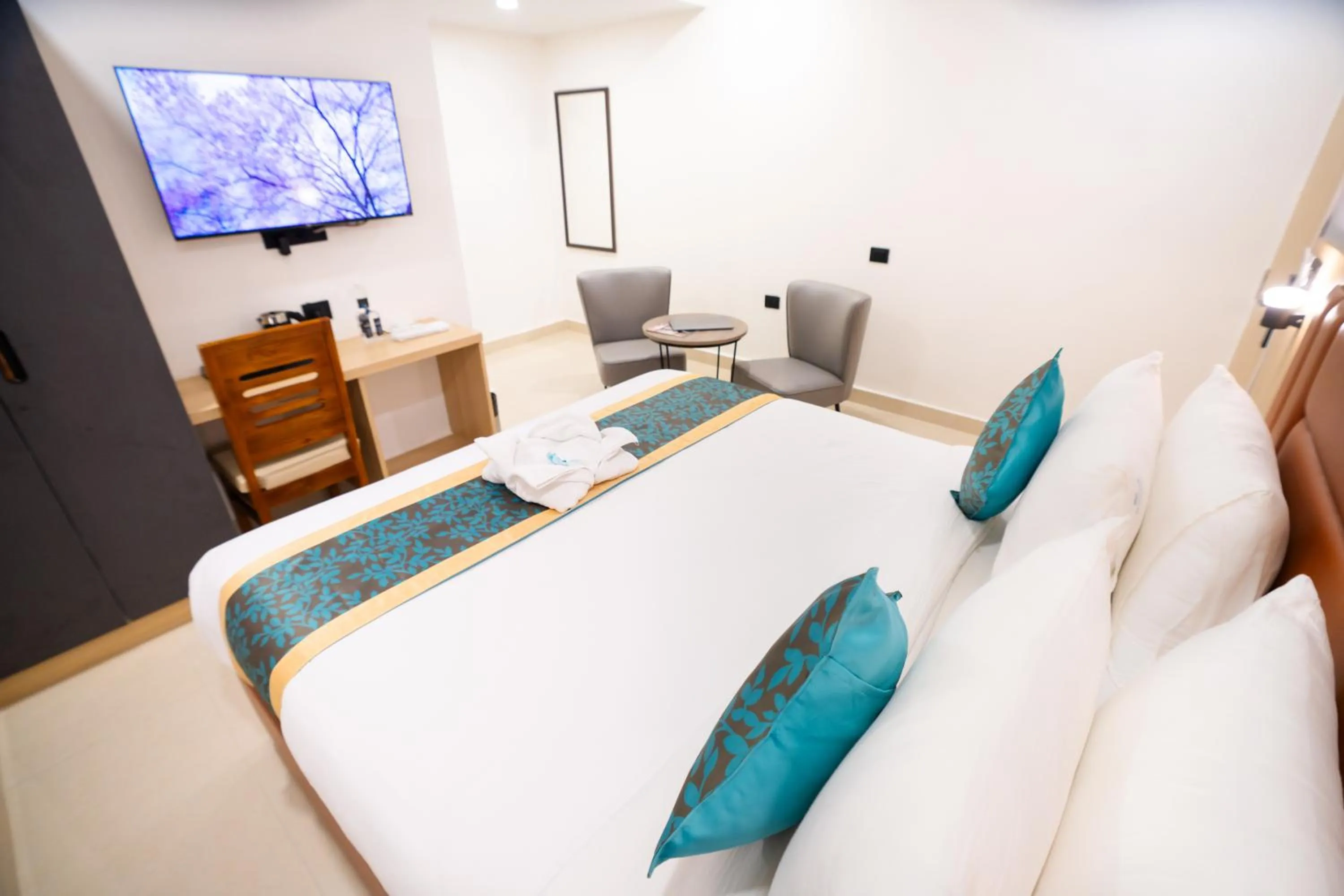 Bedroom, Bed in Sunrise Business Hotel, S R Nagar - Ameerpet