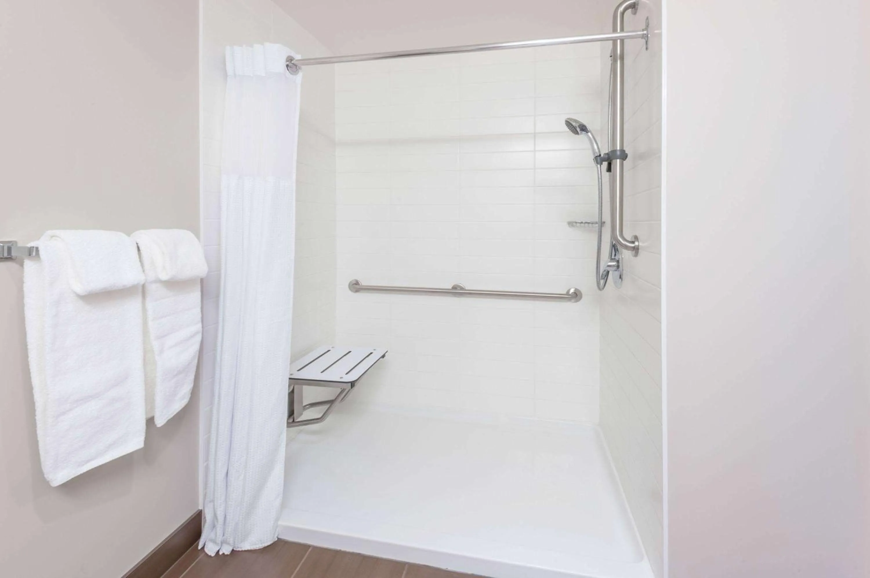 Shower in Microtel Inn & Suites by Wyndham Fort Saint John