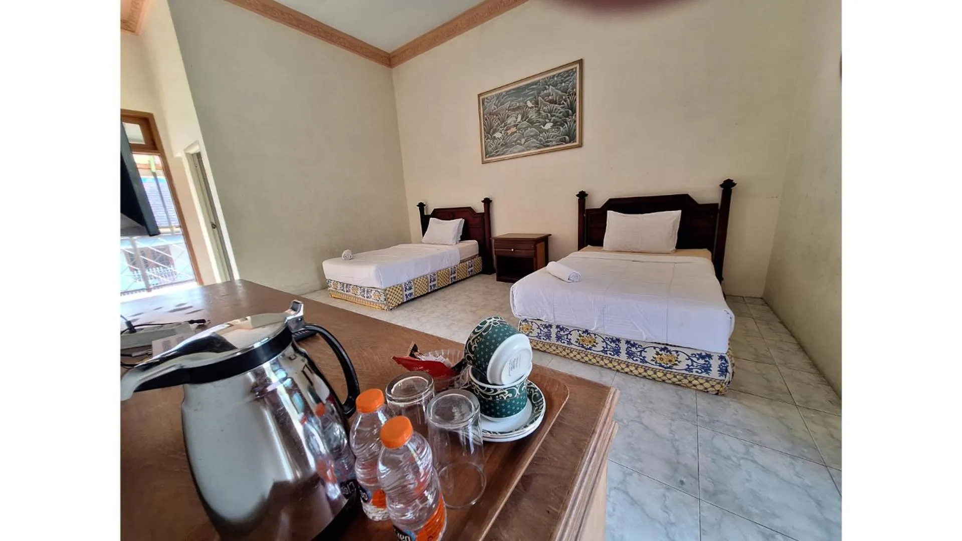 Photo of the whole room, Bed in PLUM Hotel Palereman Batu