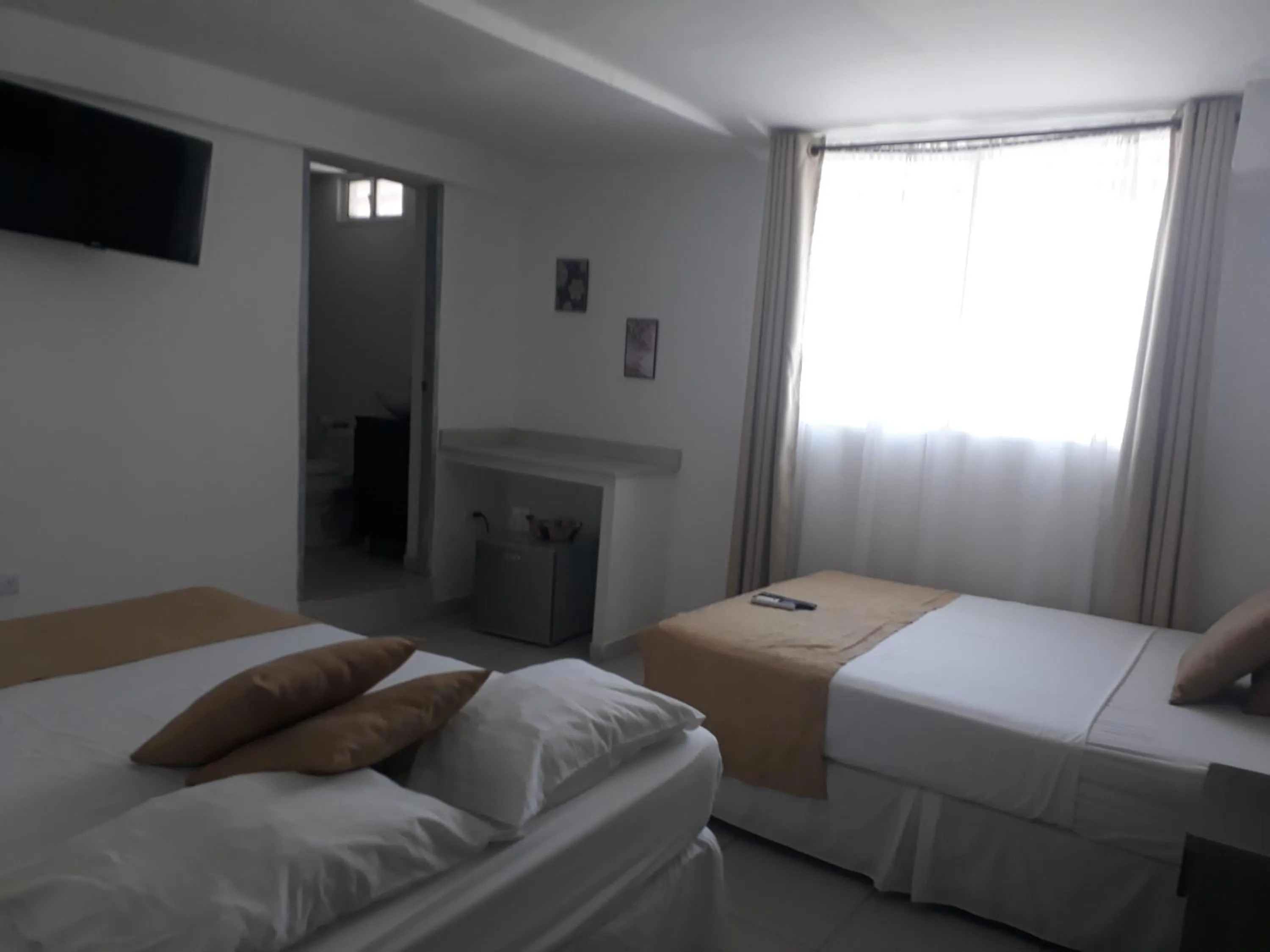 TV and multimedia, Bed in Mintaka Hotel + Lounge