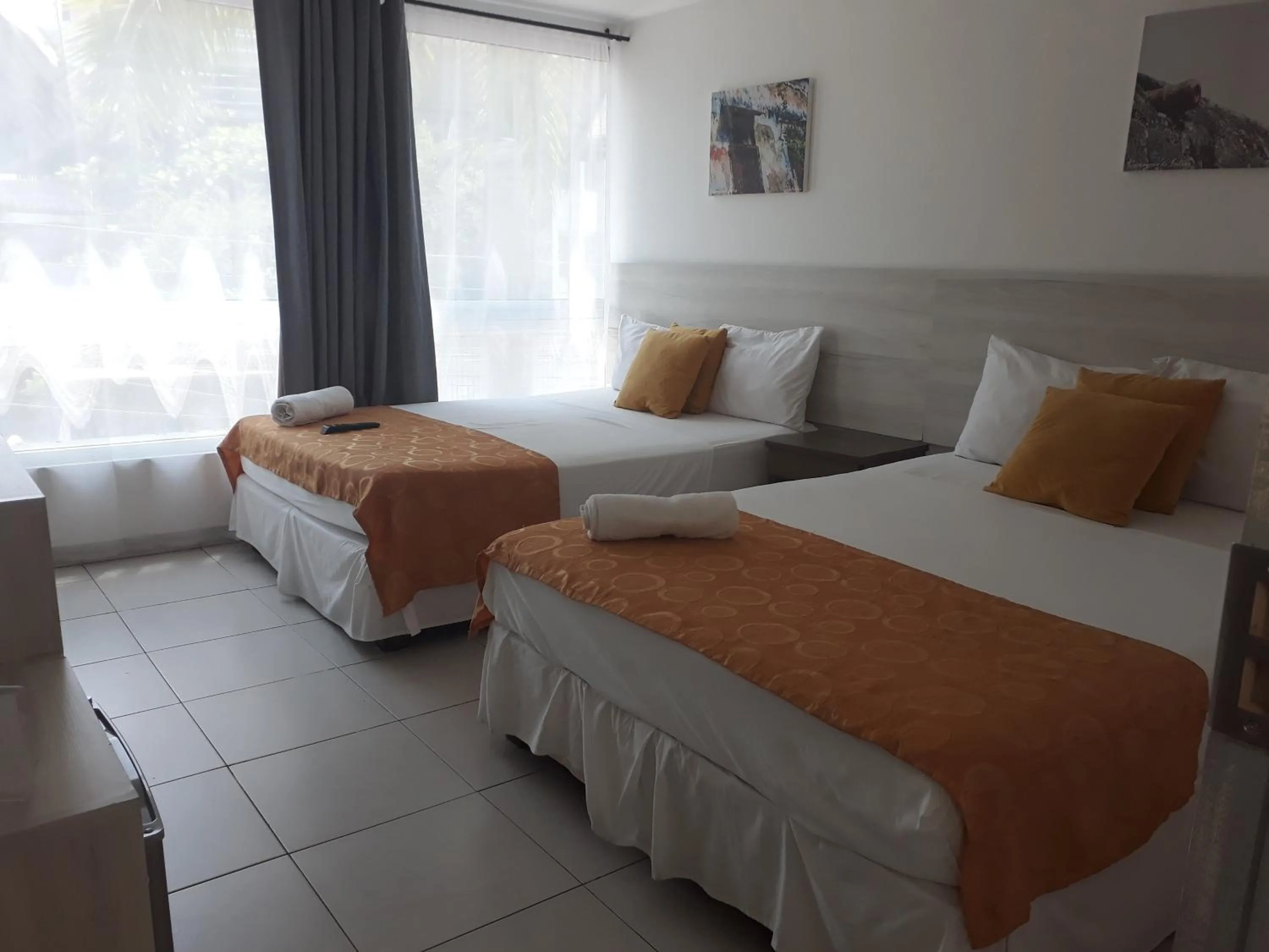 Photo of the whole room, Bed in Mintaka Hotel + Lounge