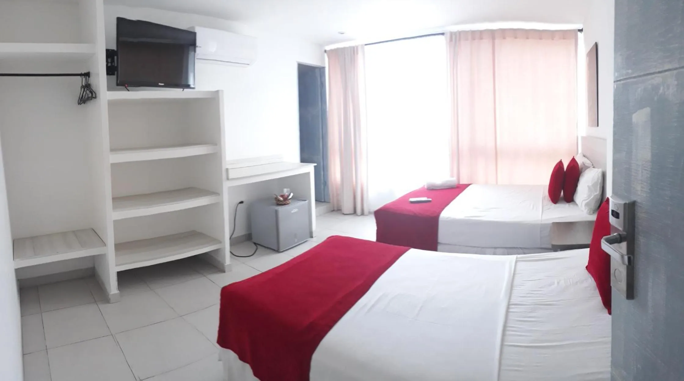 Photo of the whole room, Bed in Mintaka Hotel + Lounge