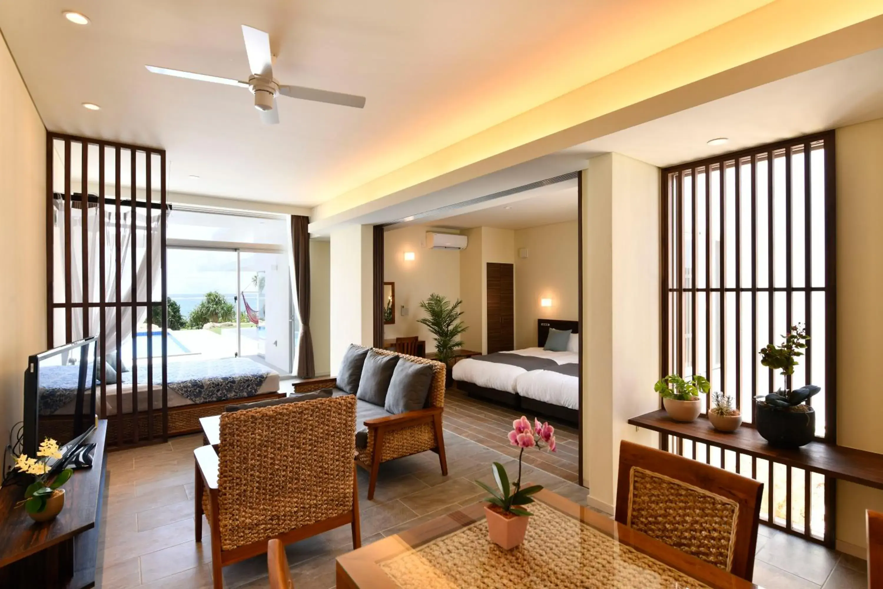 Living room, Bed in Feliz Villa Suite Miyakojima Ueno Living room, Bed in Feliz Villa Suite Miyakojima Ueno