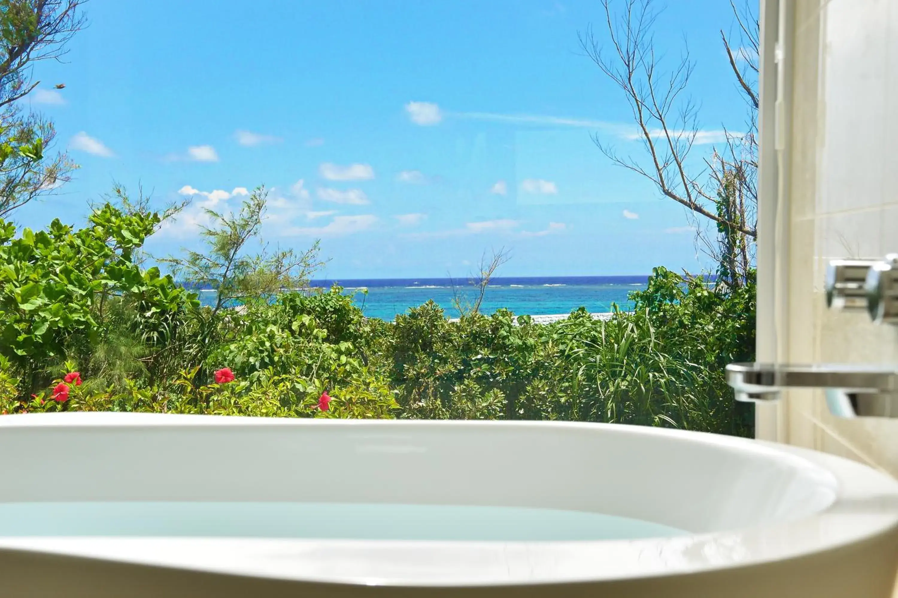 Sea view in Feliz Villa Suite Miyakojima Ueno Sea view in Feliz Villa Suite Miyakojima Ueno