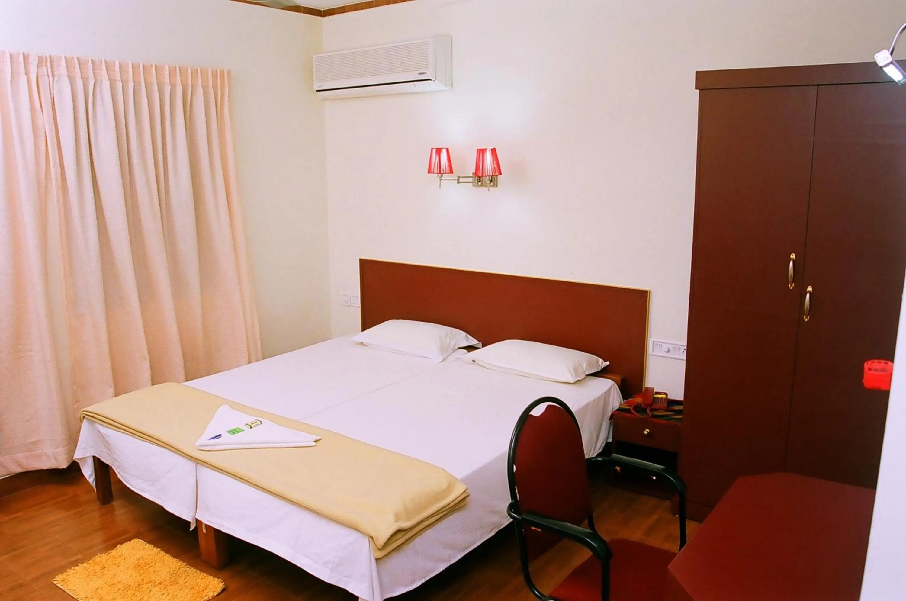 Bedroom, Bed in Hotel Srinivas