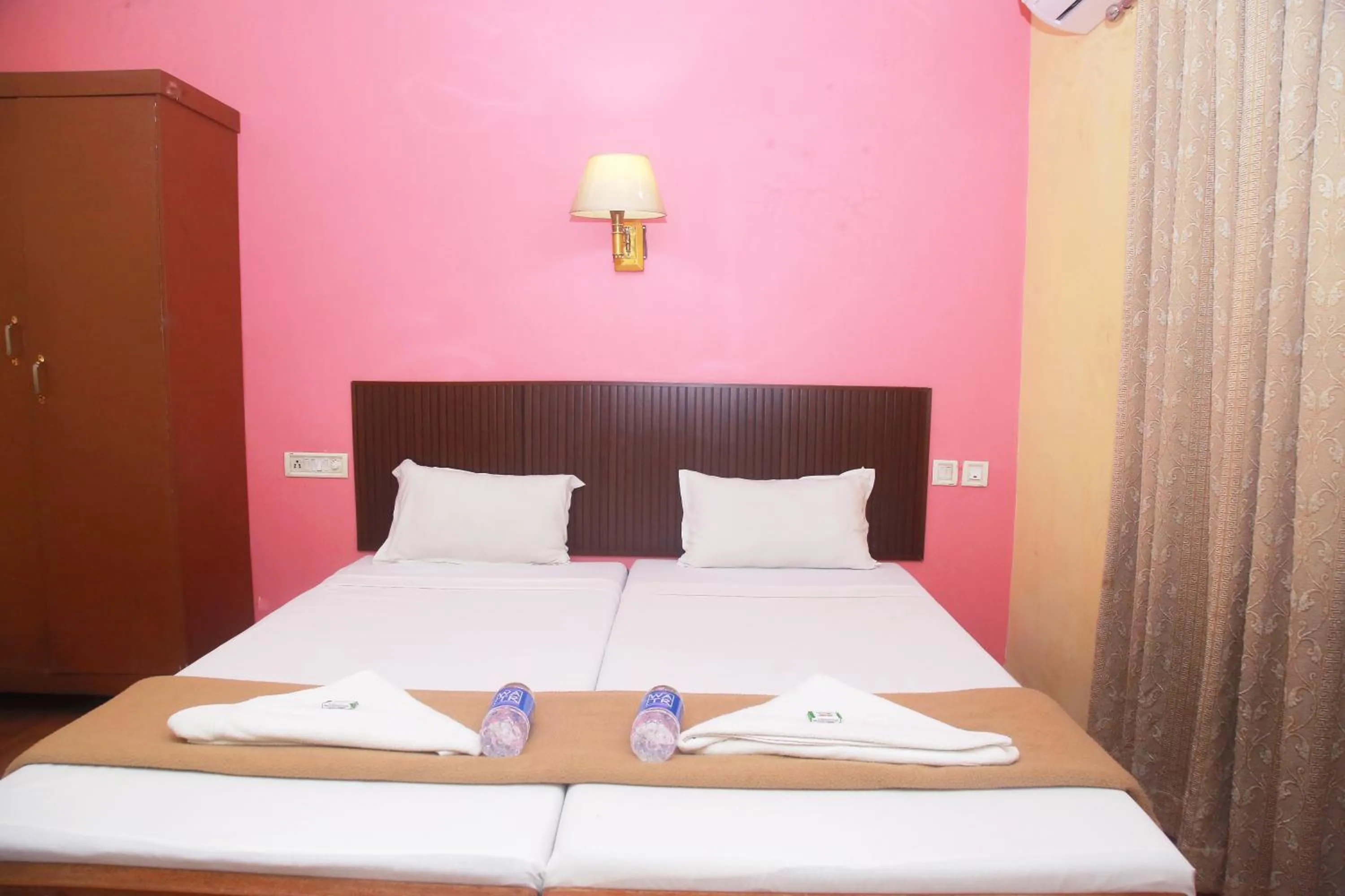 Bed in Hotel Srinivas