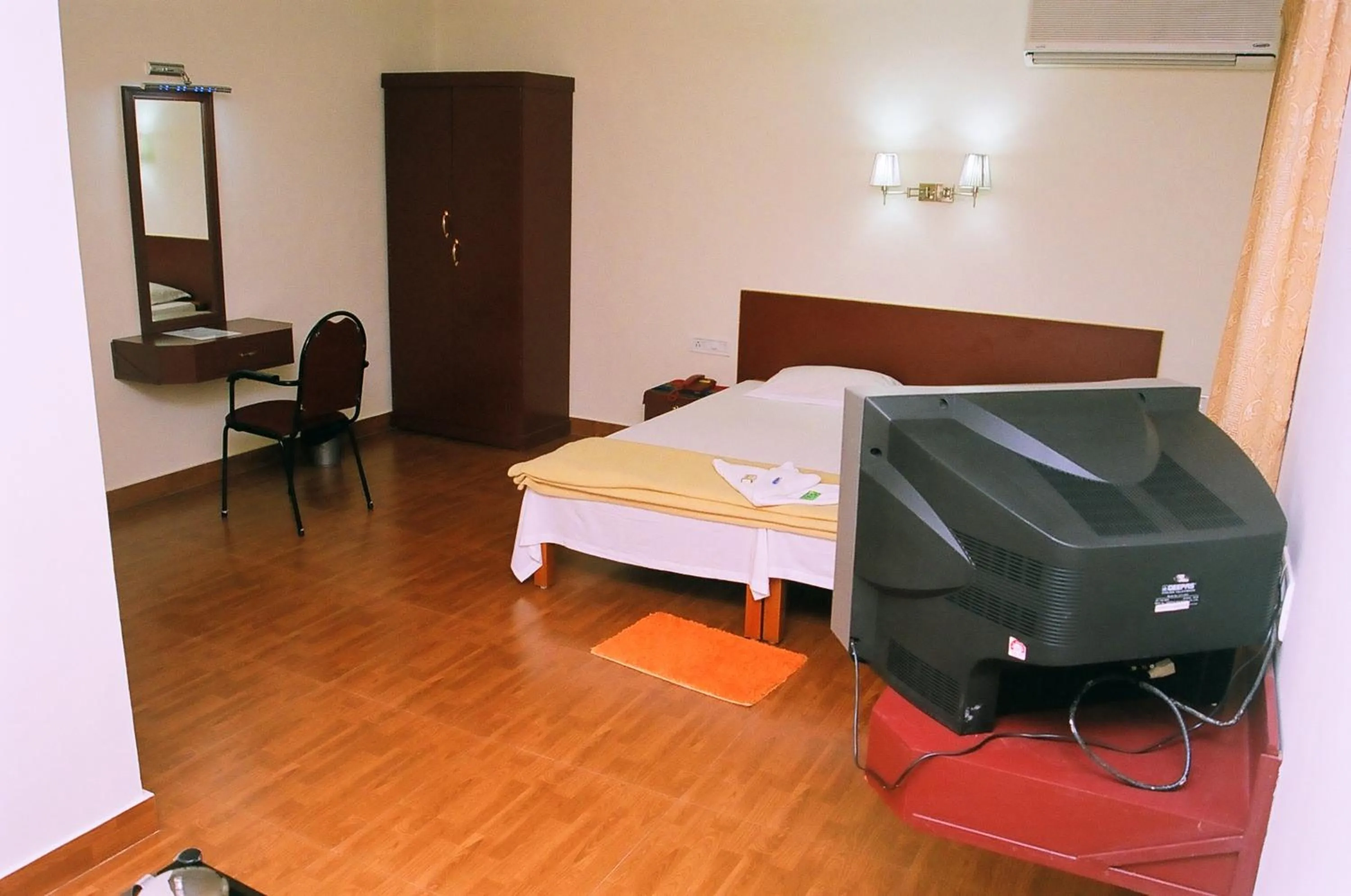 Photo of the whole room, Bed in Hotel Srinivas