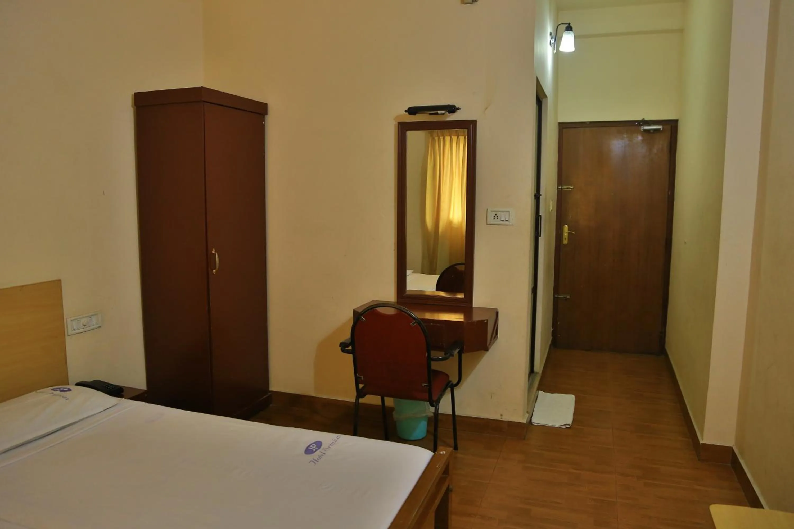 Bedroom, Bed in Hotel Srinivas