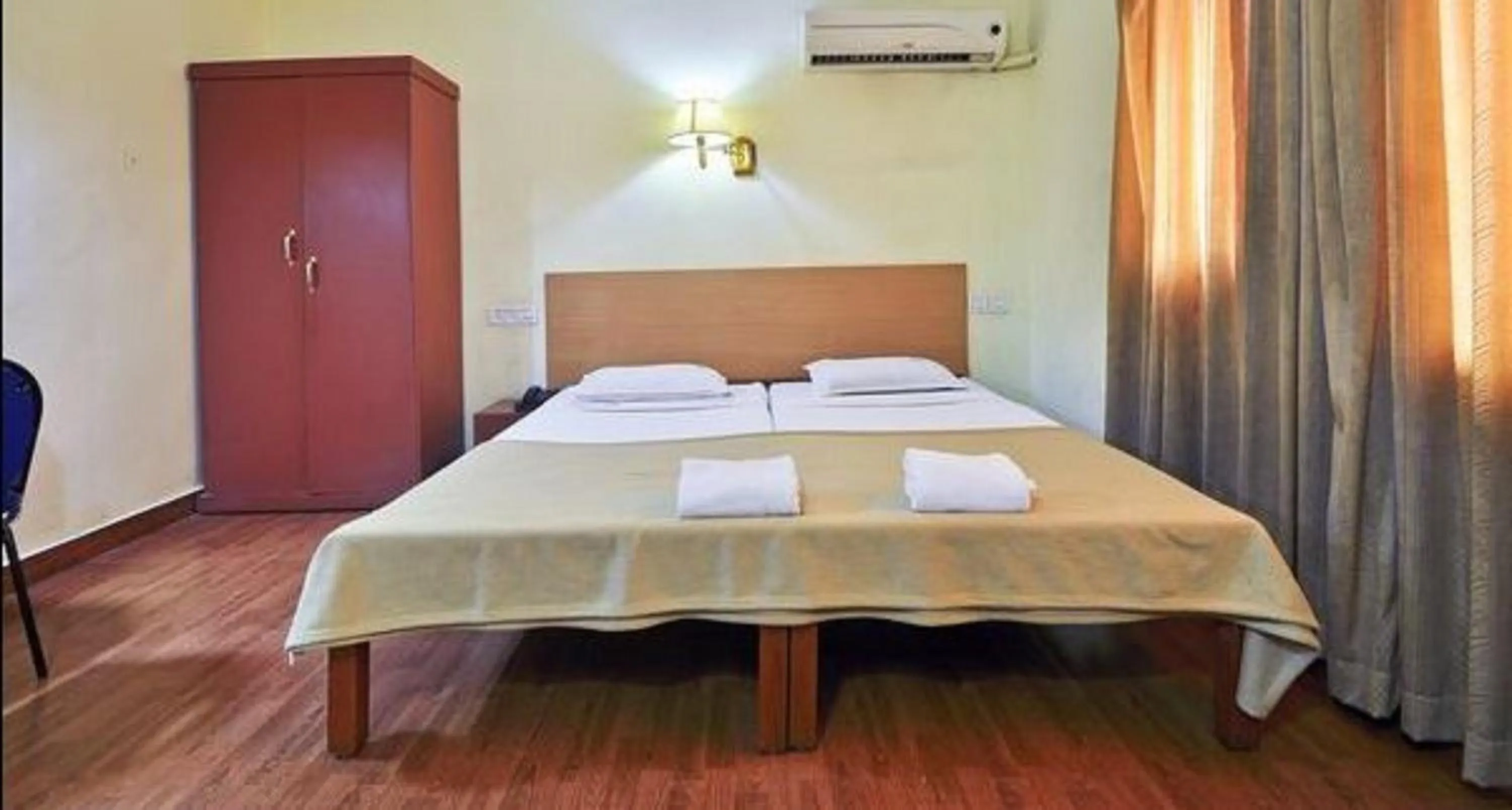 Bedroom, Bed in Hotel Srinivas