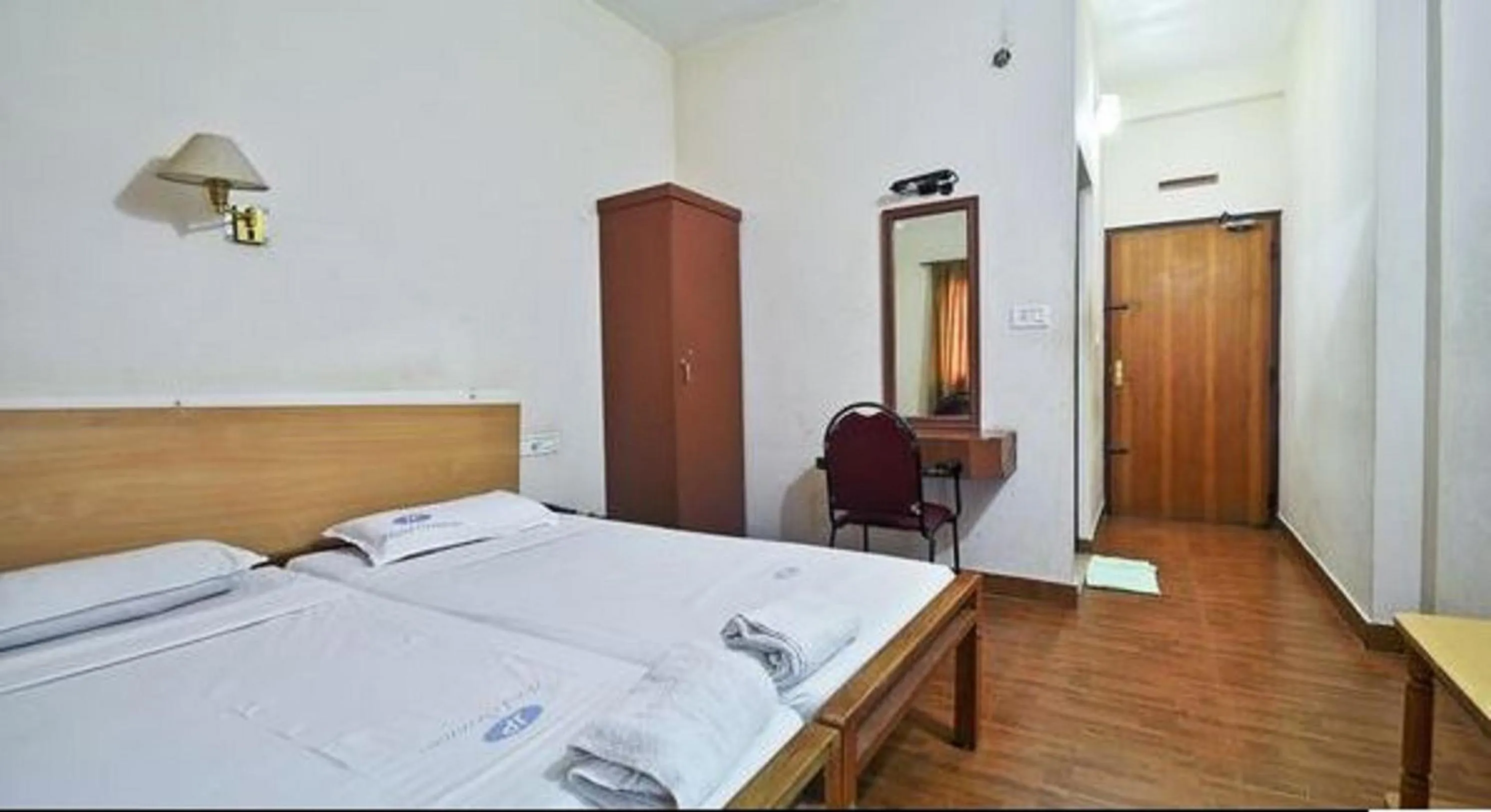 Photo of the whole room, Bed in Hotel Srinivas