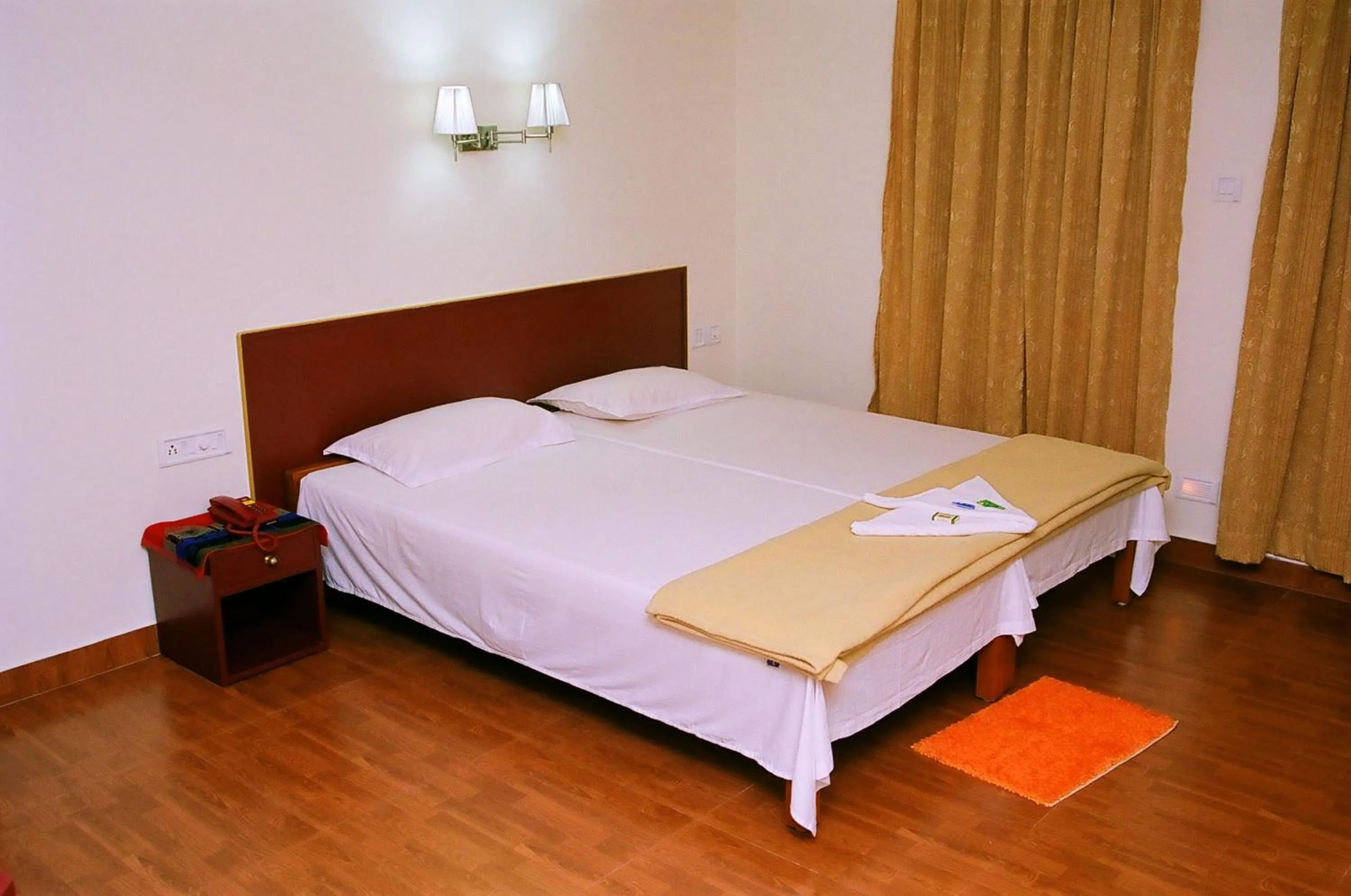 Bed in Hotel Srinivas