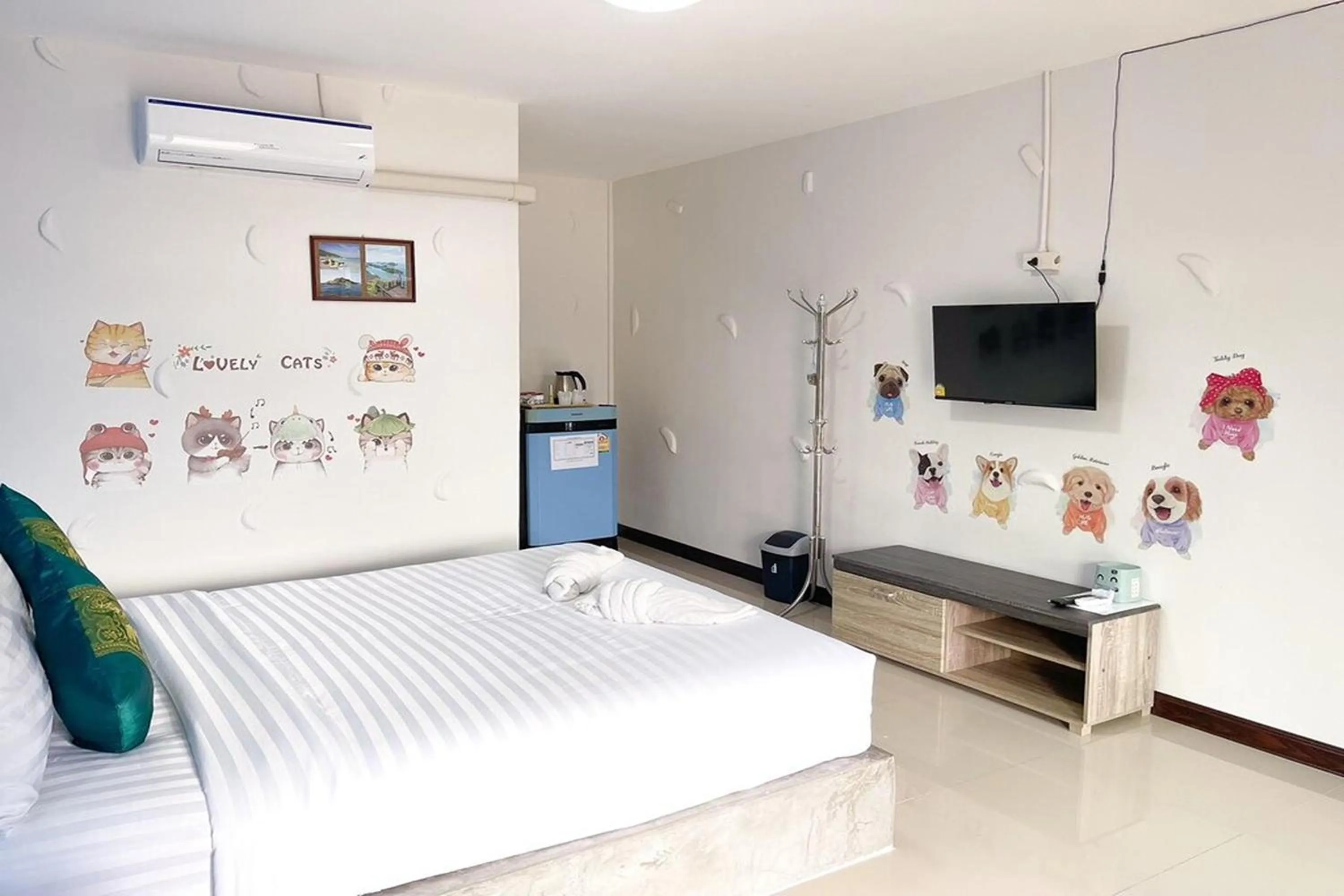 Bed in Pai Tawan Resort Hotel - Pet friendly