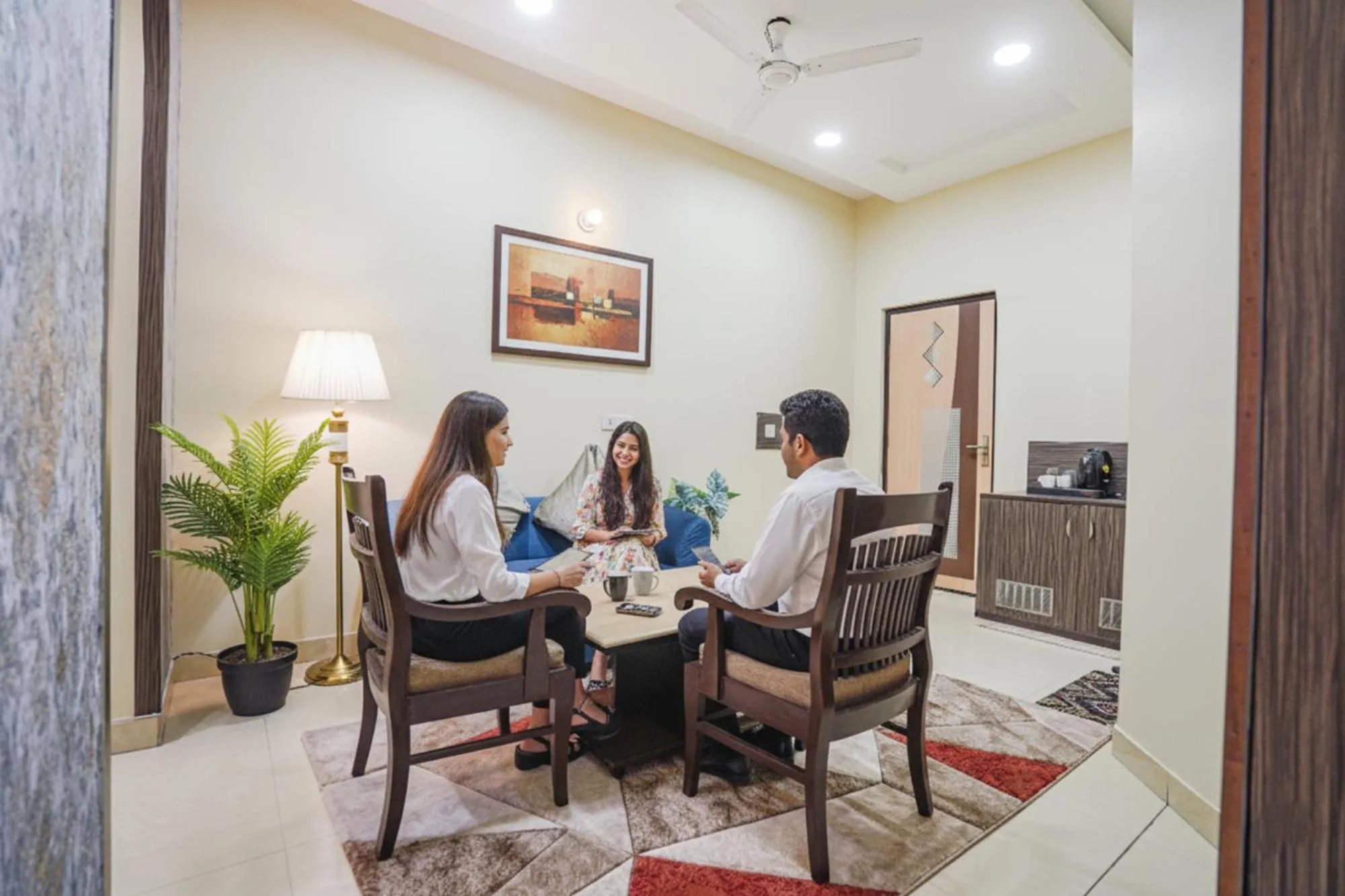 Seating area in FabHotel Rivlet Premium - Nr Jama Masjid and Red Fort