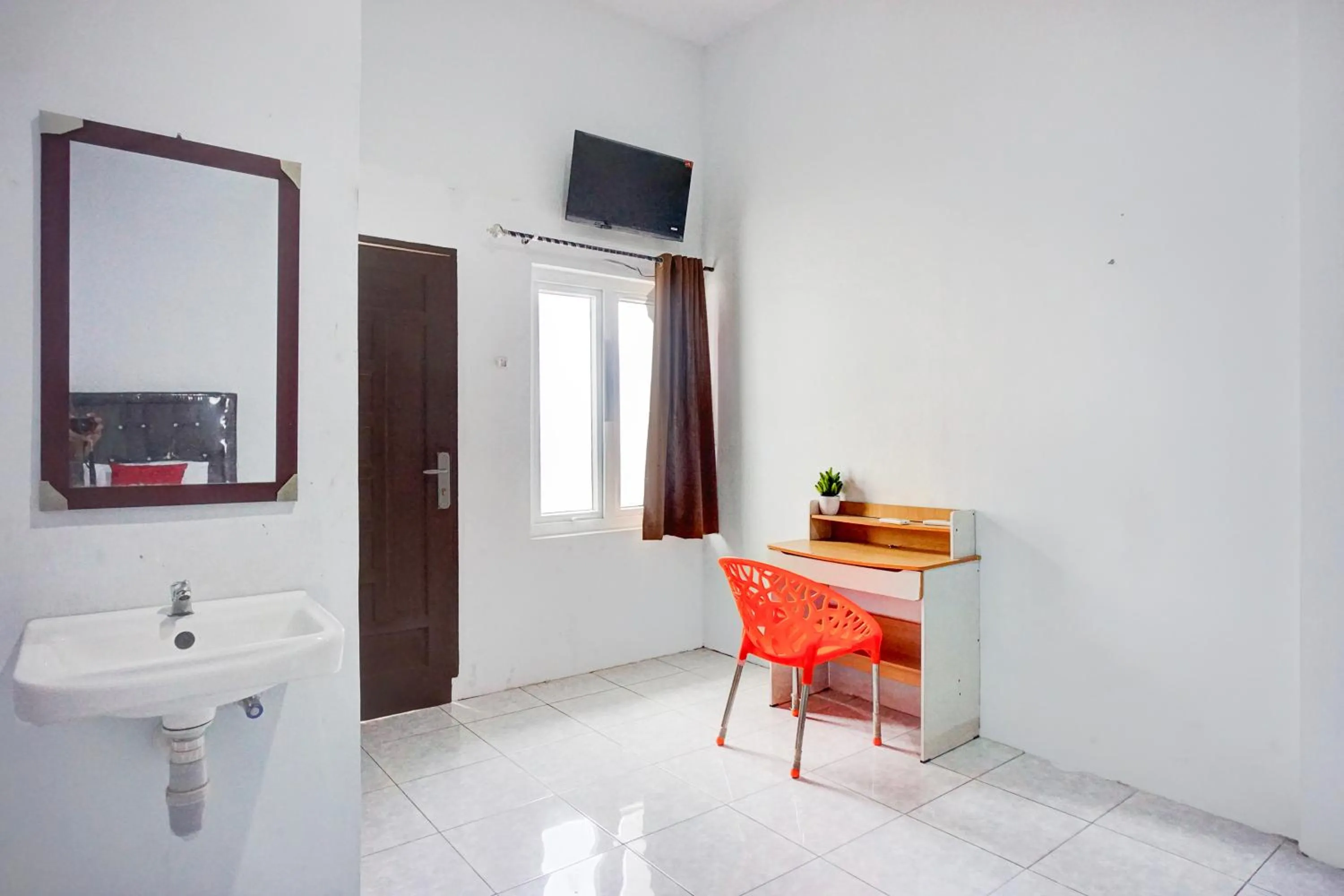 TV and multimedia in Hotel O Medan Timur Near Rsu Madani