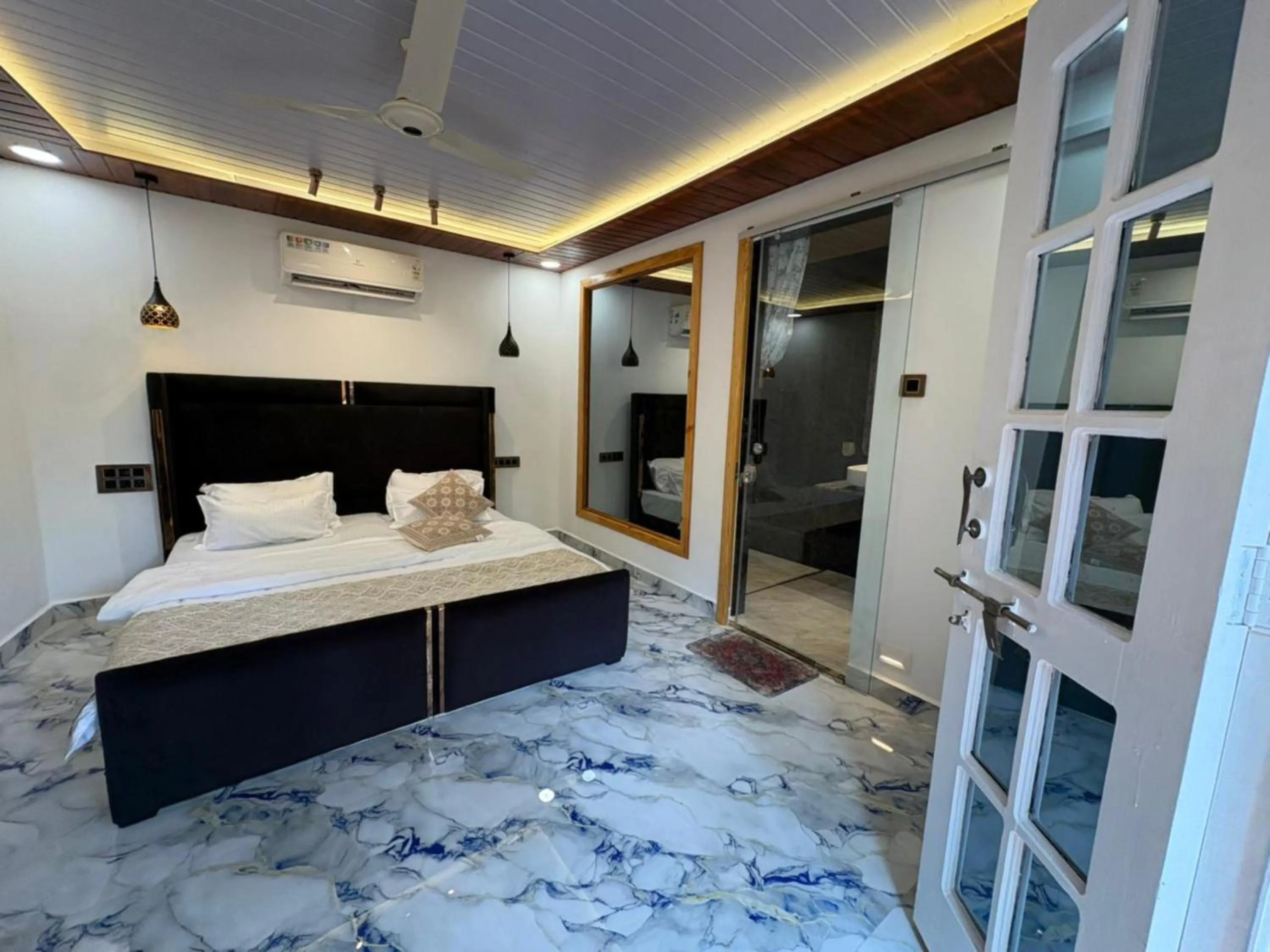 Photo of the whole room, Bed in The Charming Nights