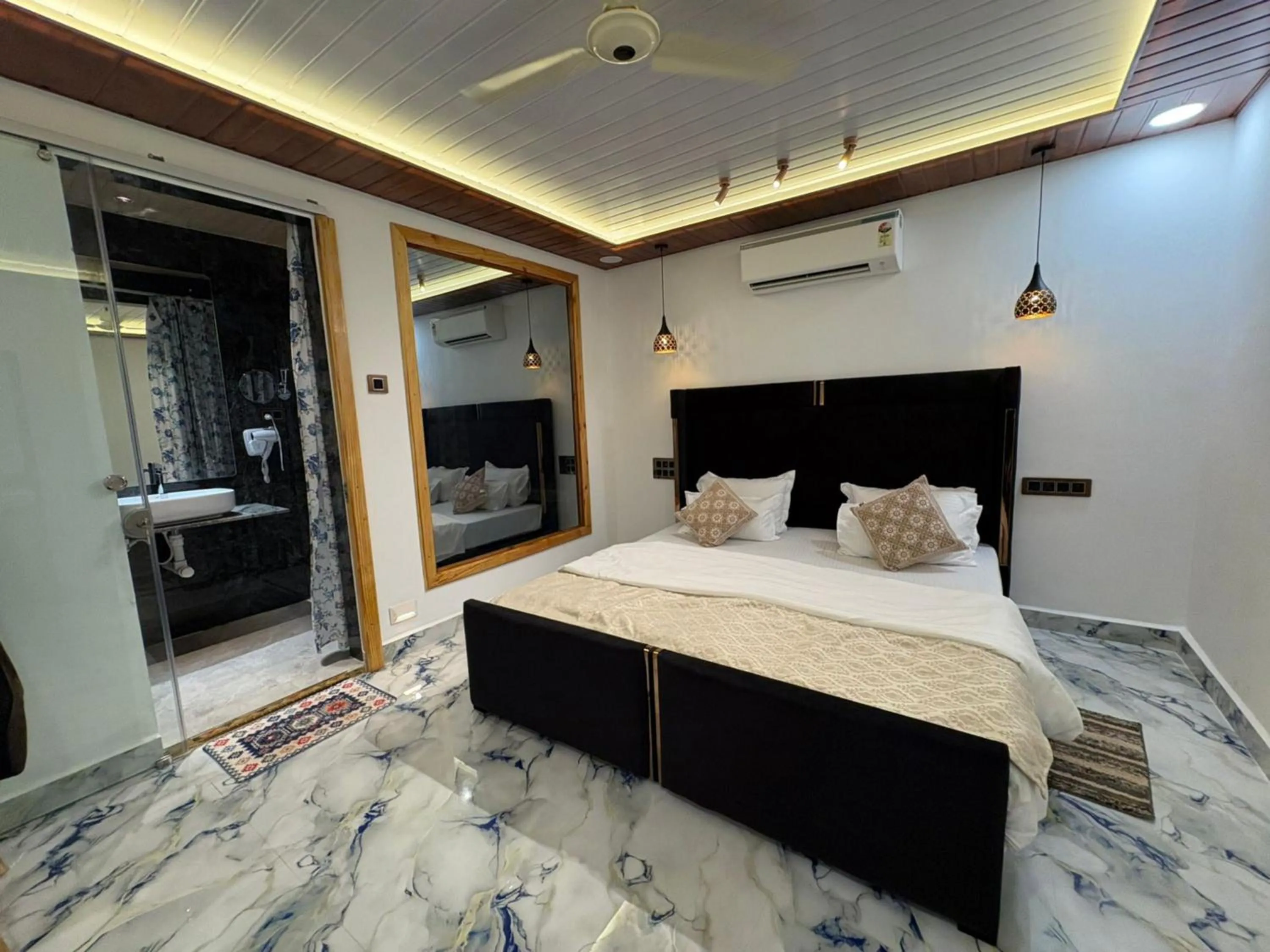 Photo of the whole room, Bed in The Charming Nights