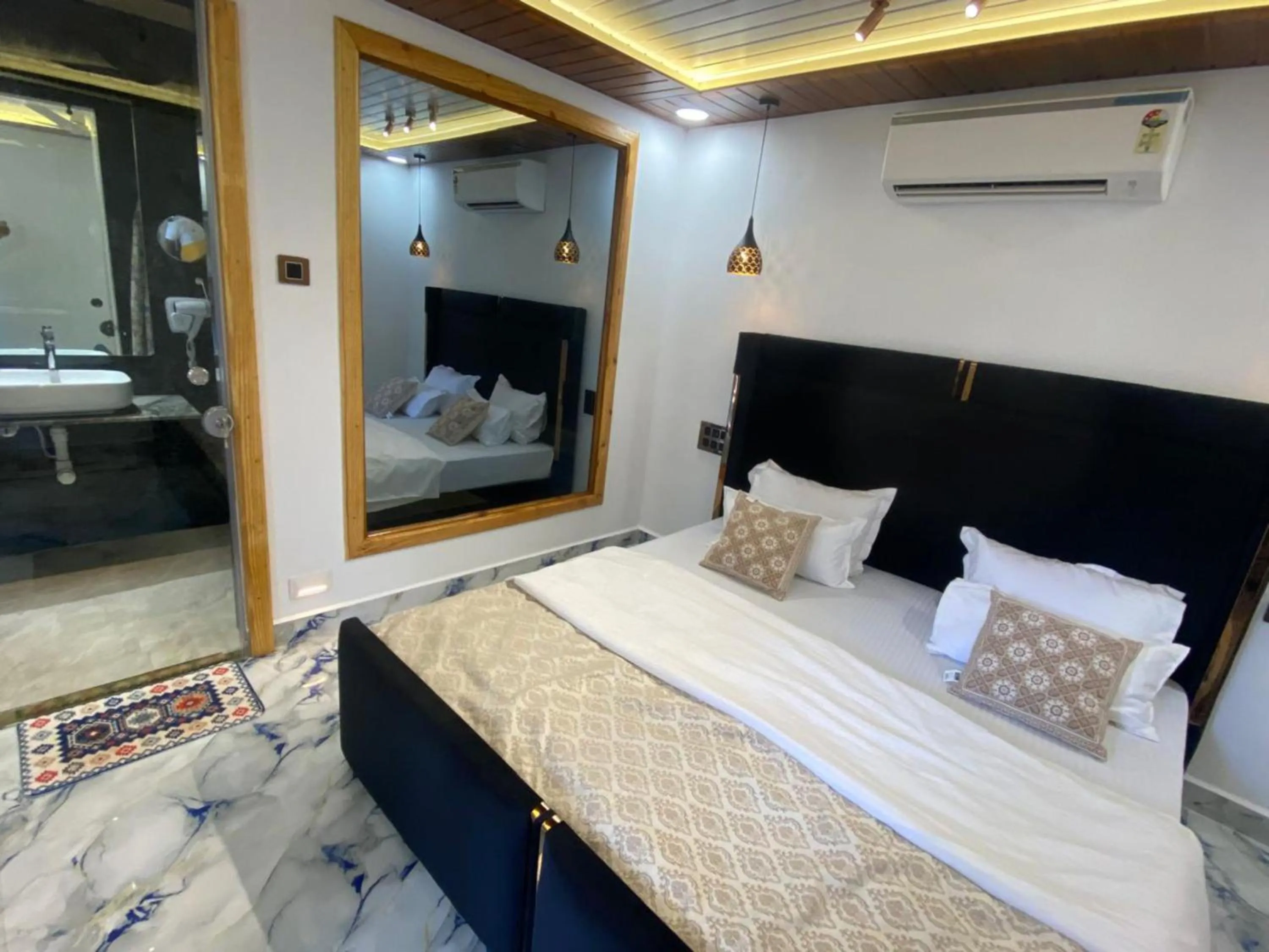 Photo of the whole room, Bed in The Charming Nights