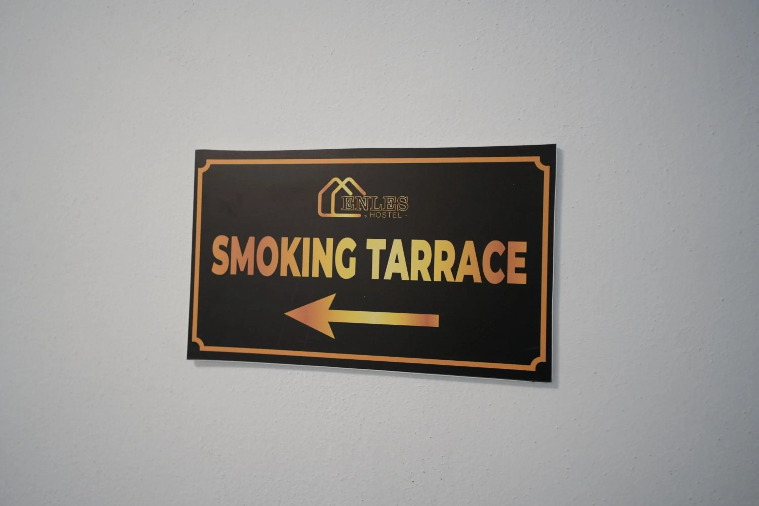 Property logo or sign in Enles Hotel