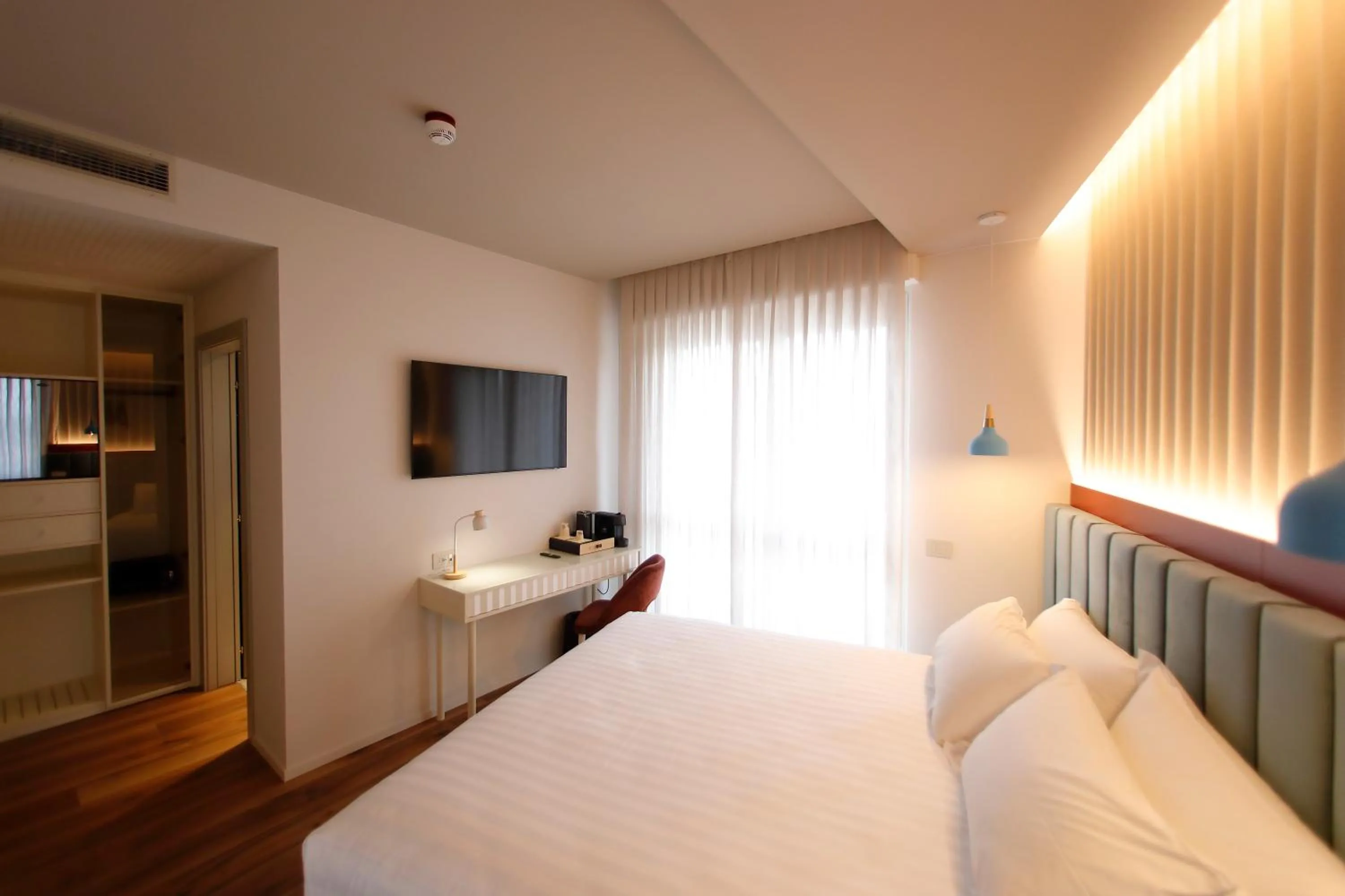 Bed in Hotel Unico by Dori
