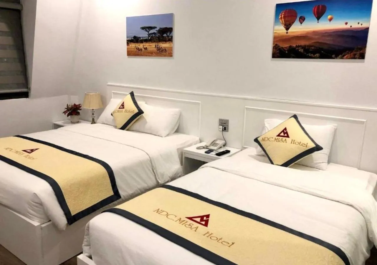 Bed in NDC MISA Hotel