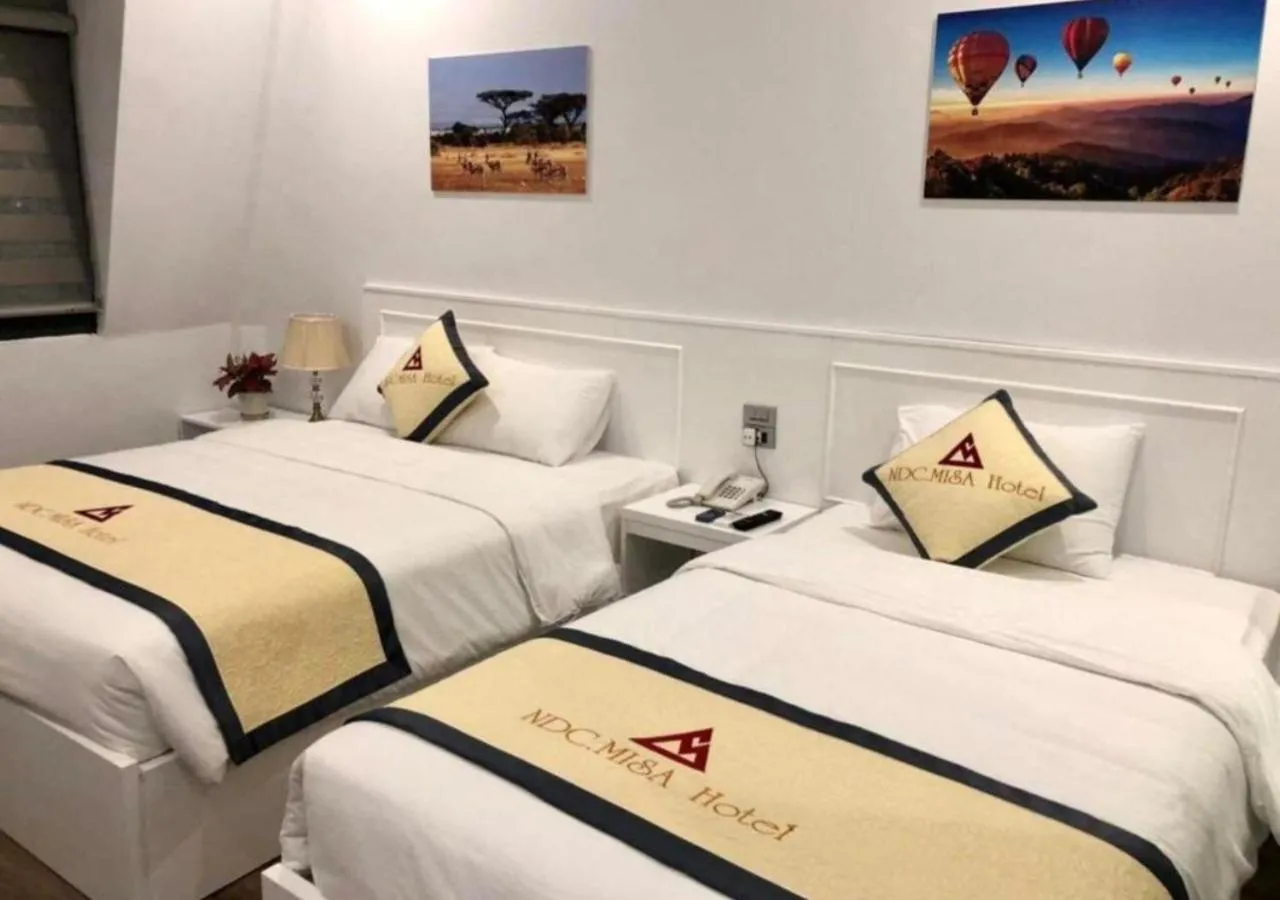 Bed in NDC MISA Hotel