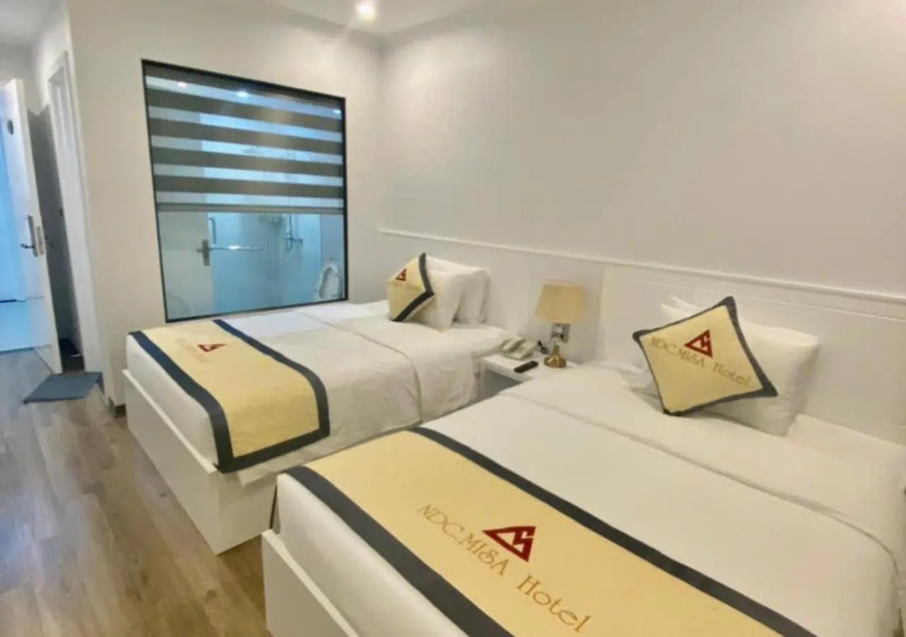 Bed in NDC MISA Hotel