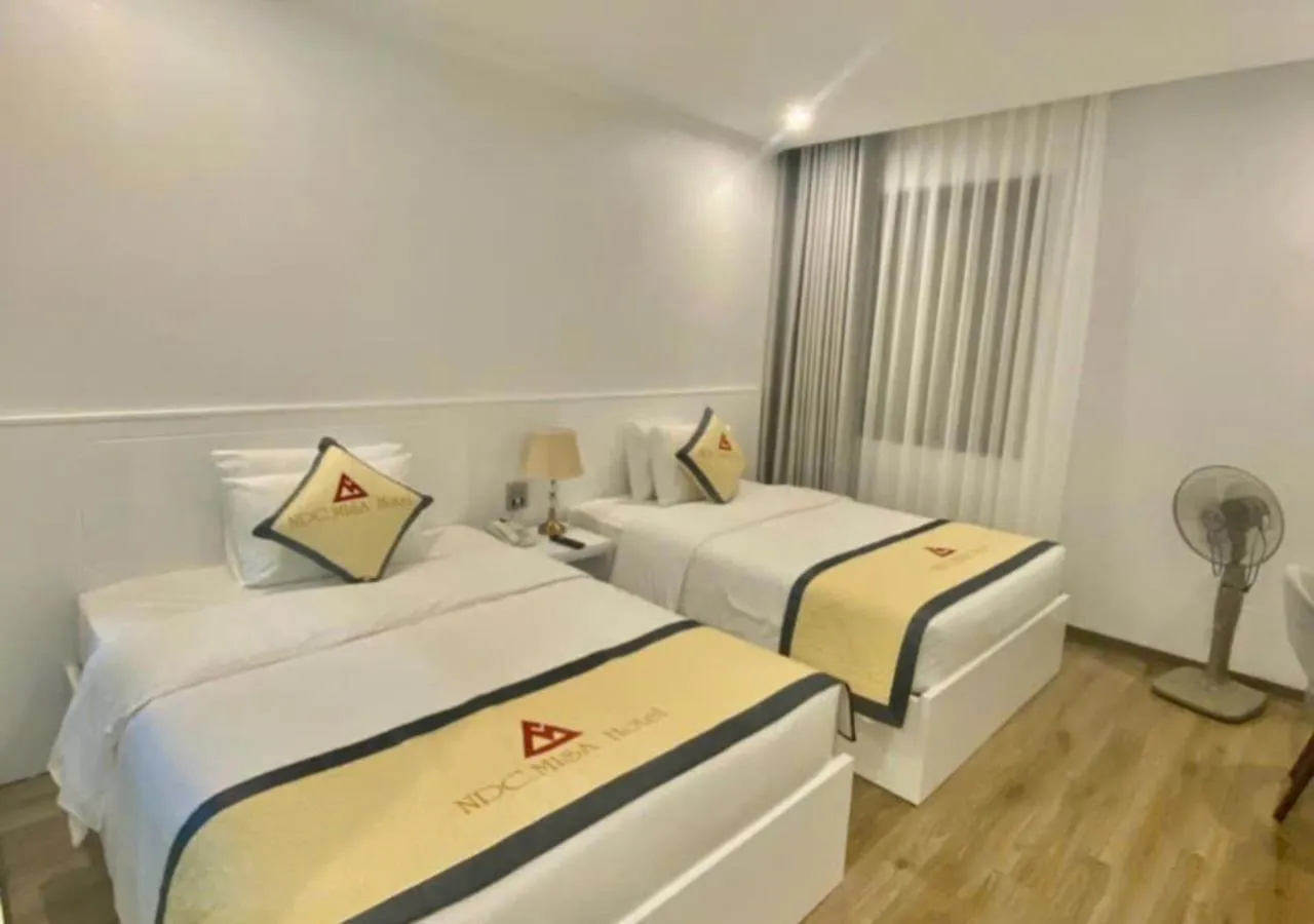 Bed in NDC MISA Hotel