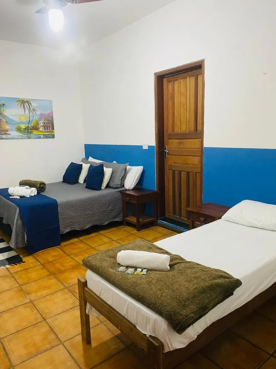 Living room, Bed in POUSO DE ICARO - POUSADA NO CENTRO de PARATY
