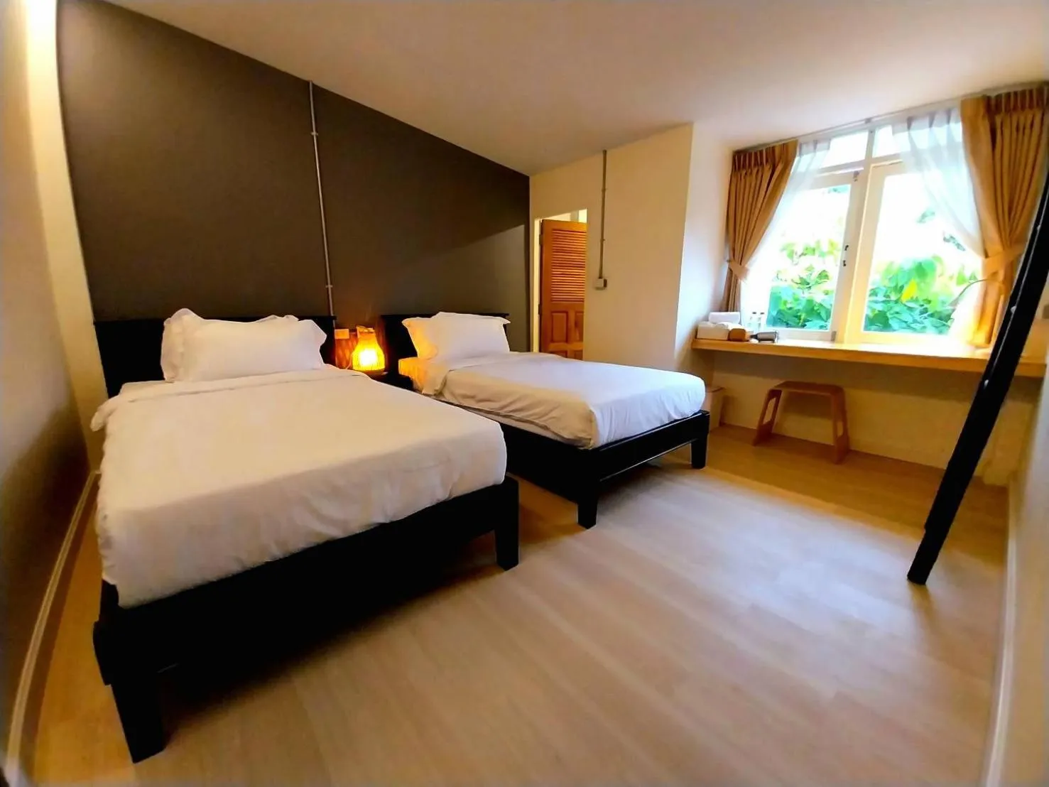 Bed in To The Moon Guesthouse